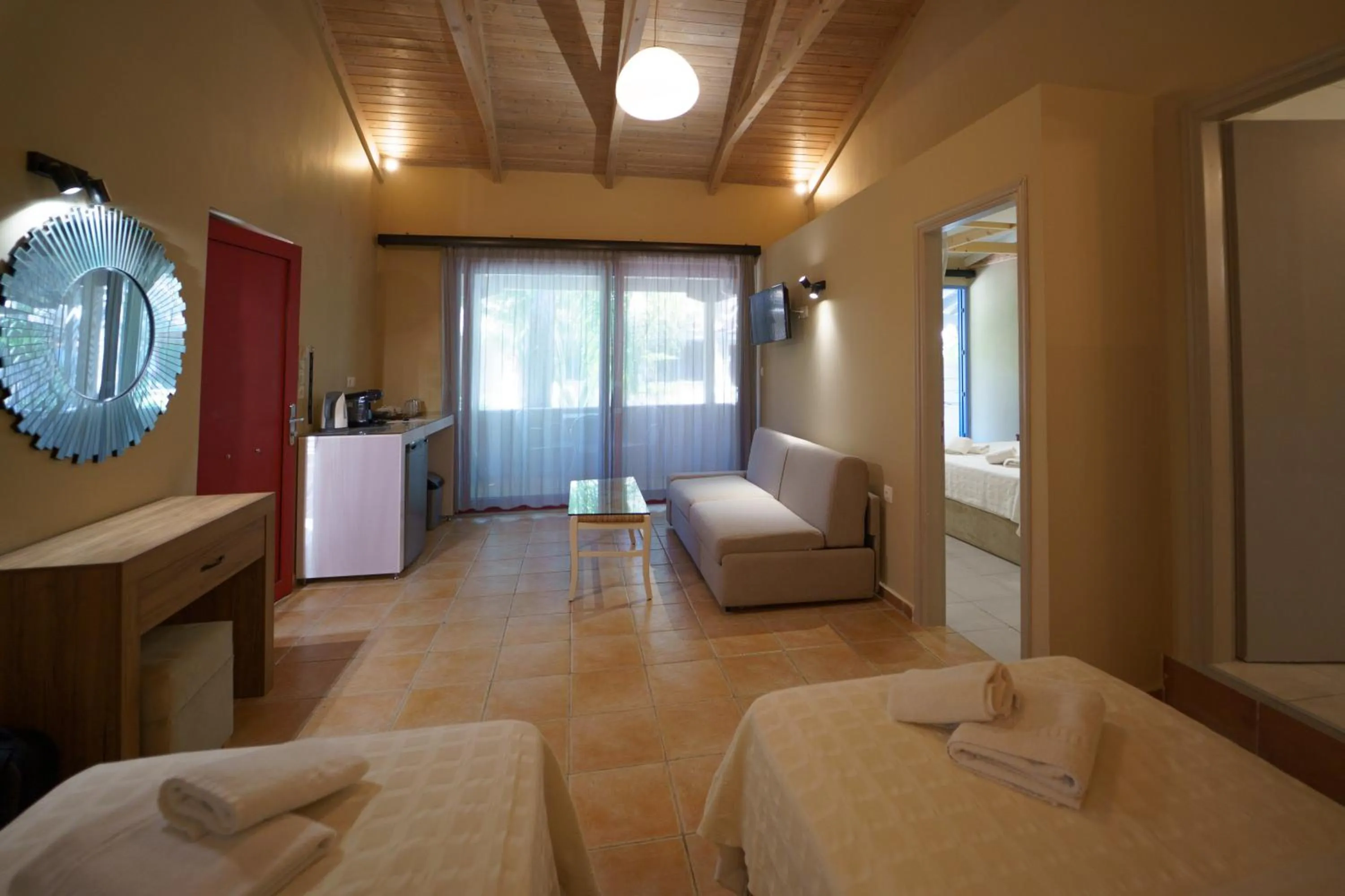 Bed in Rouda Bay Beach Hotel