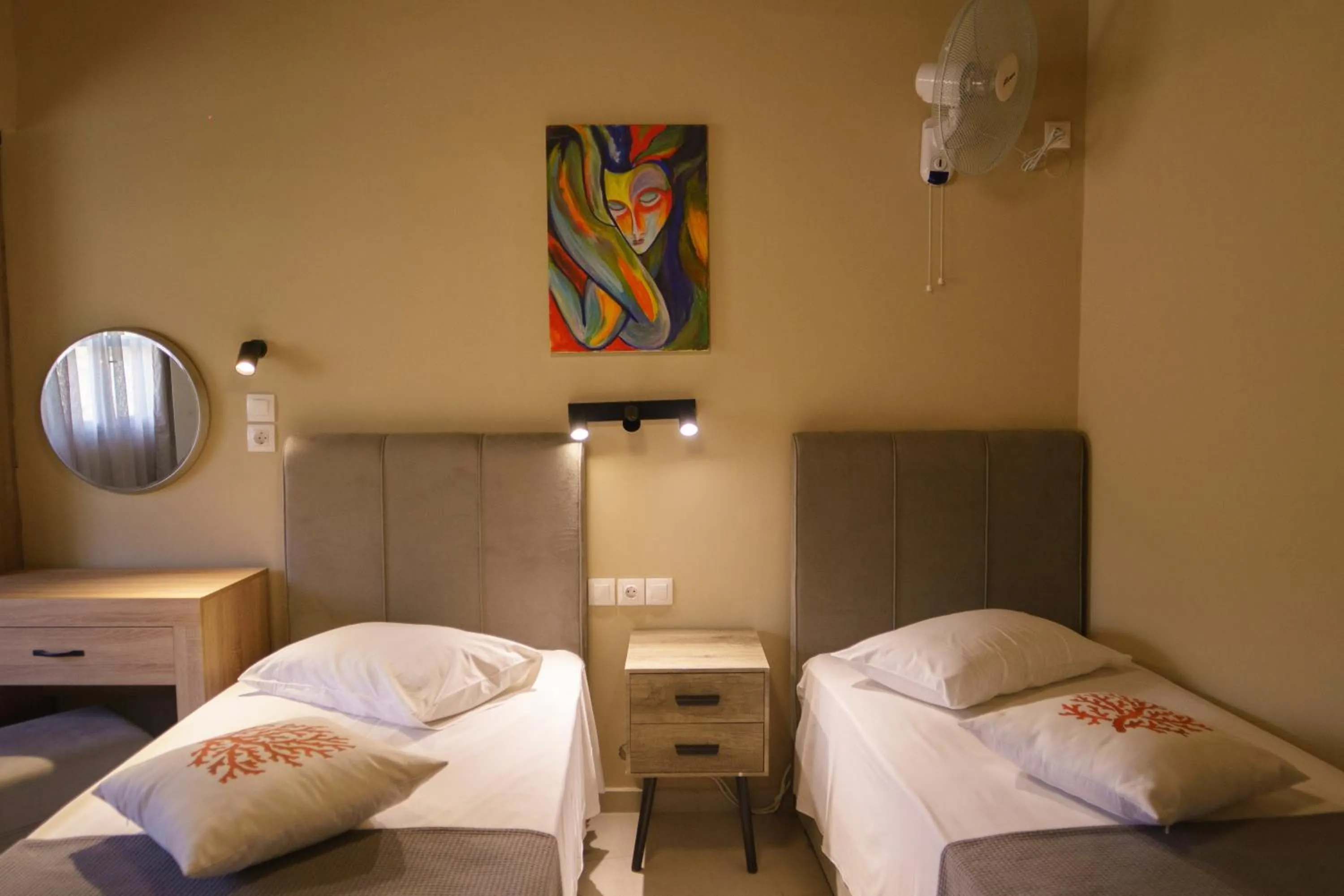 Bed in Rouda Bay Beach Hotel