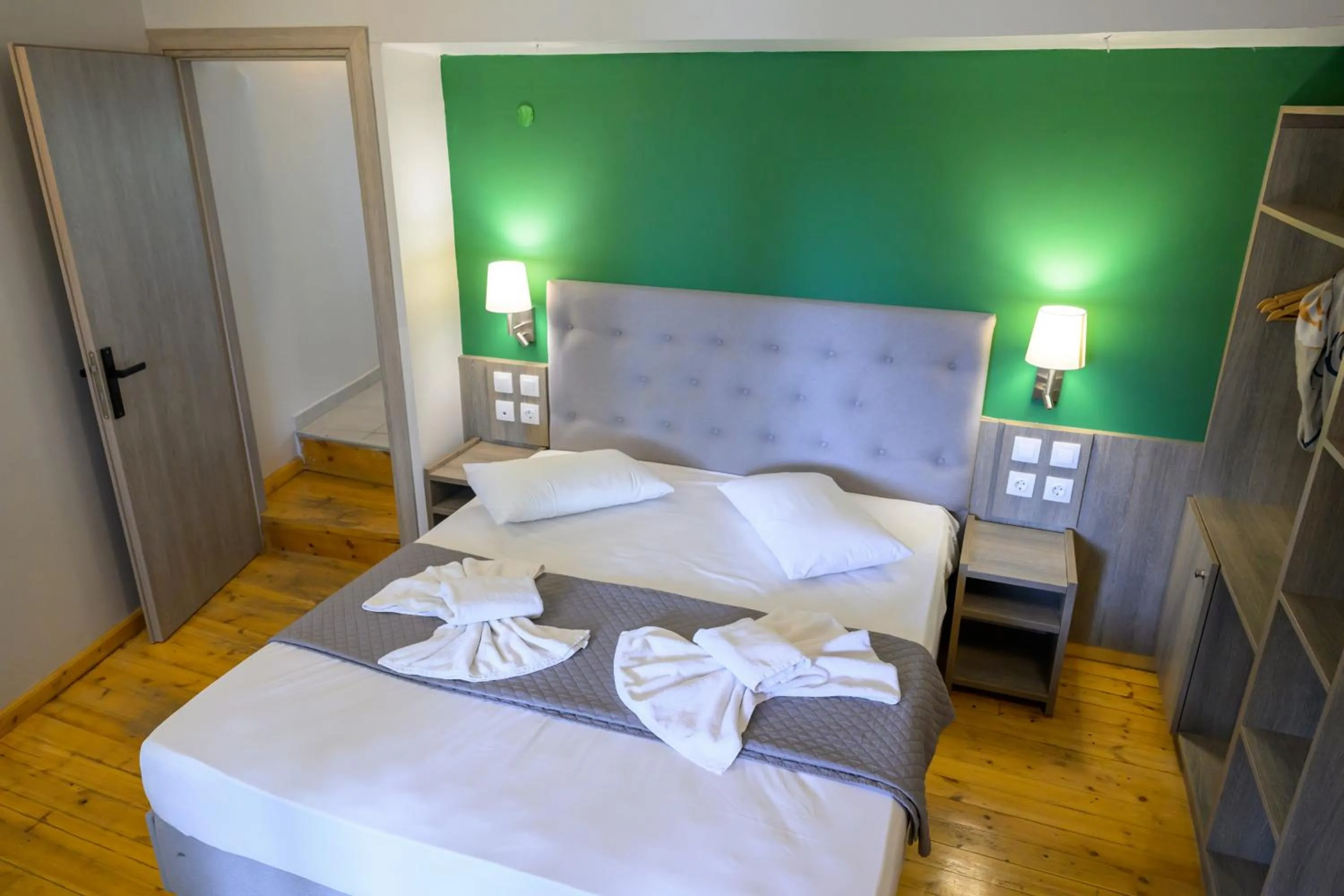 Bed in Rouda Bay Beach Hotel