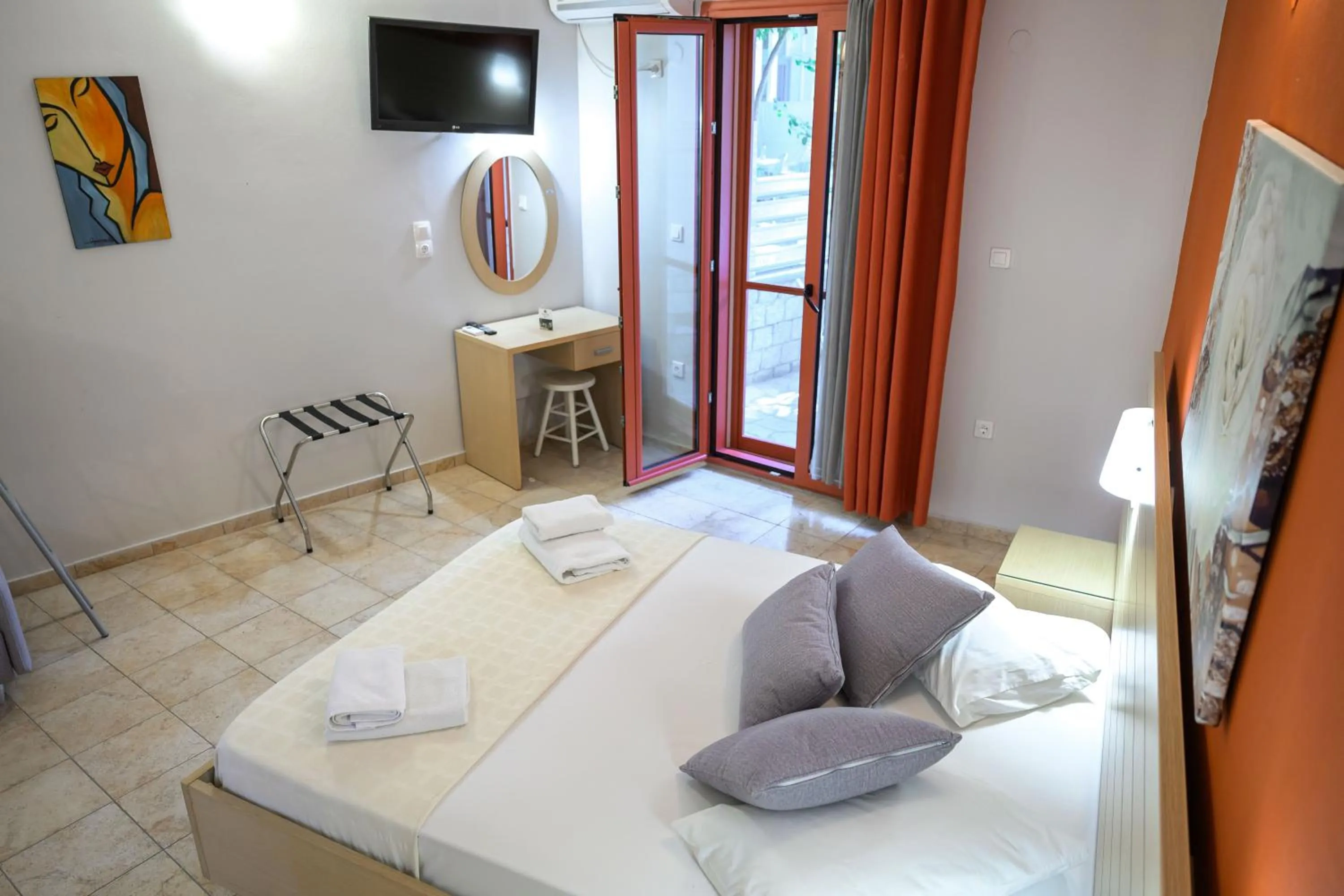 Bed in Rouda Bay Beach Hotel