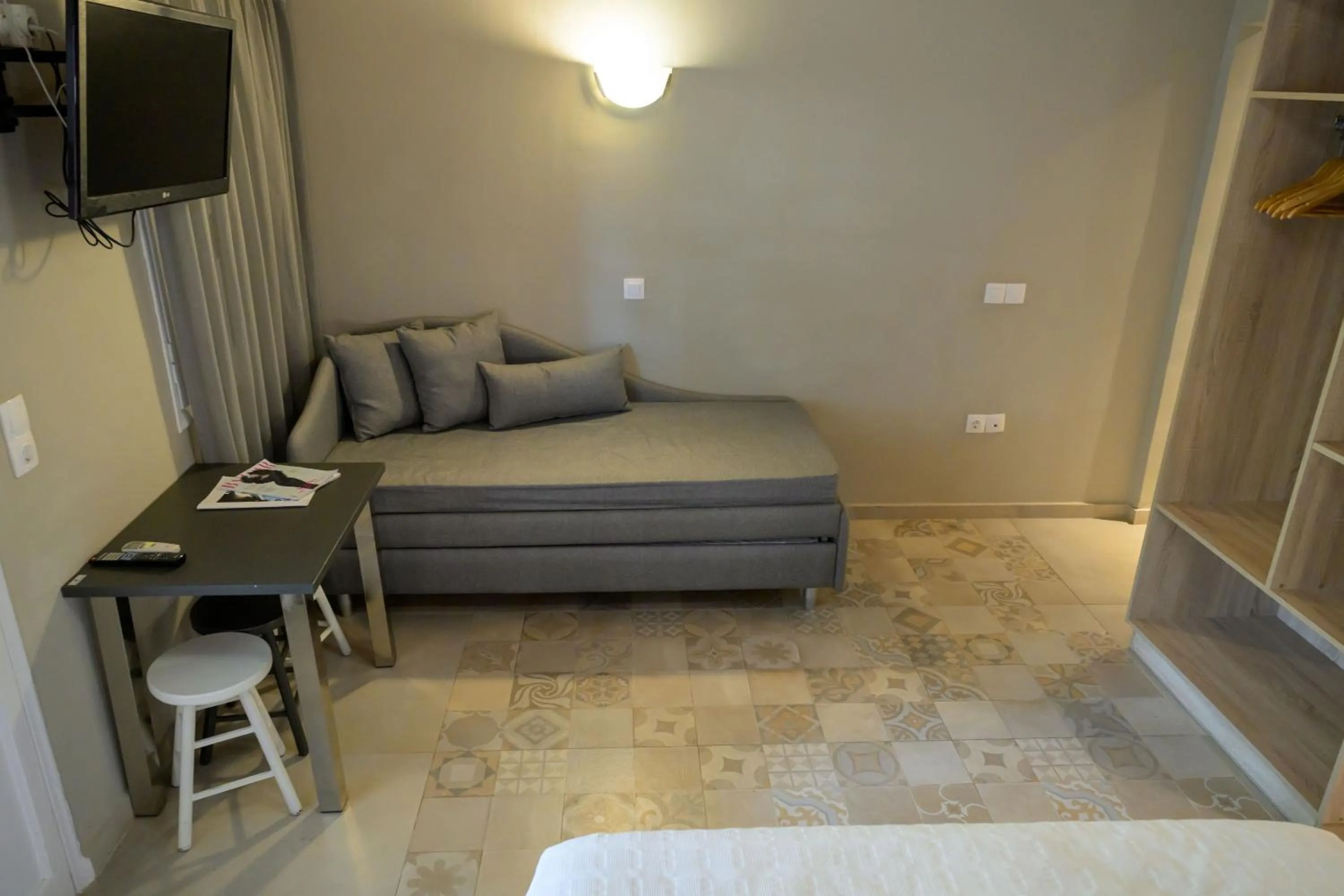 Bed in Rouda Bay Beach Hotel