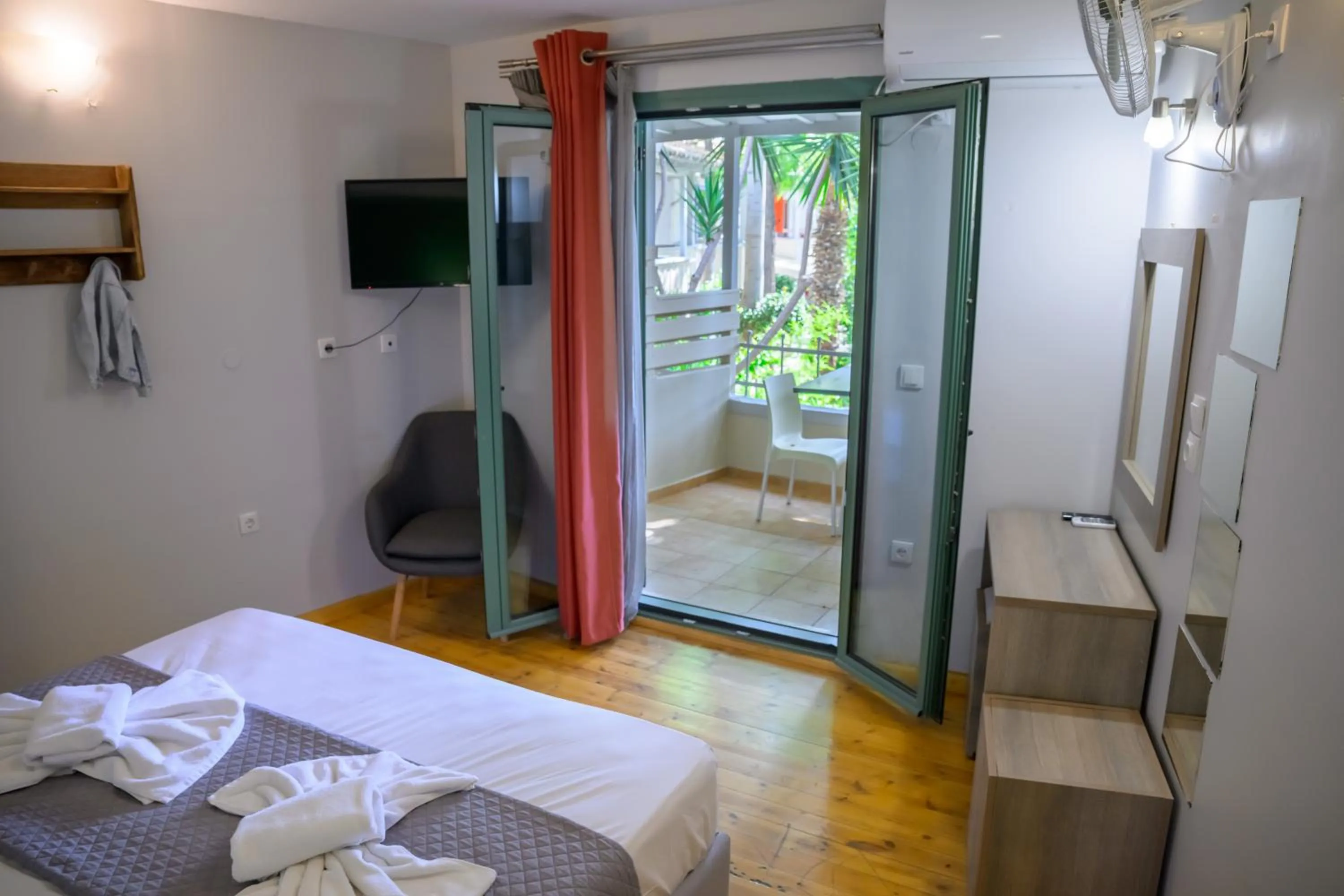 Bed in Rouda Bay Beach Hotel