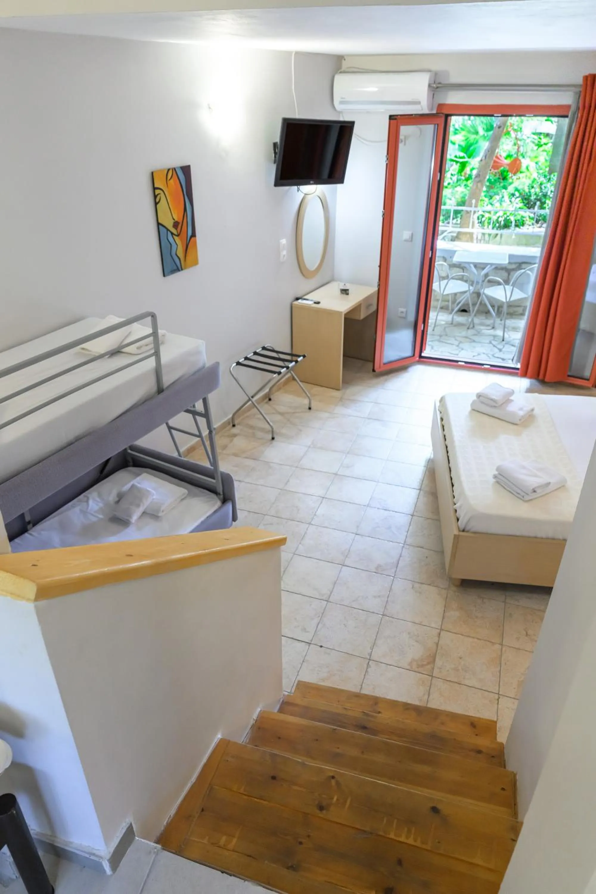 Bed in Rouda Bay Beach Hotel