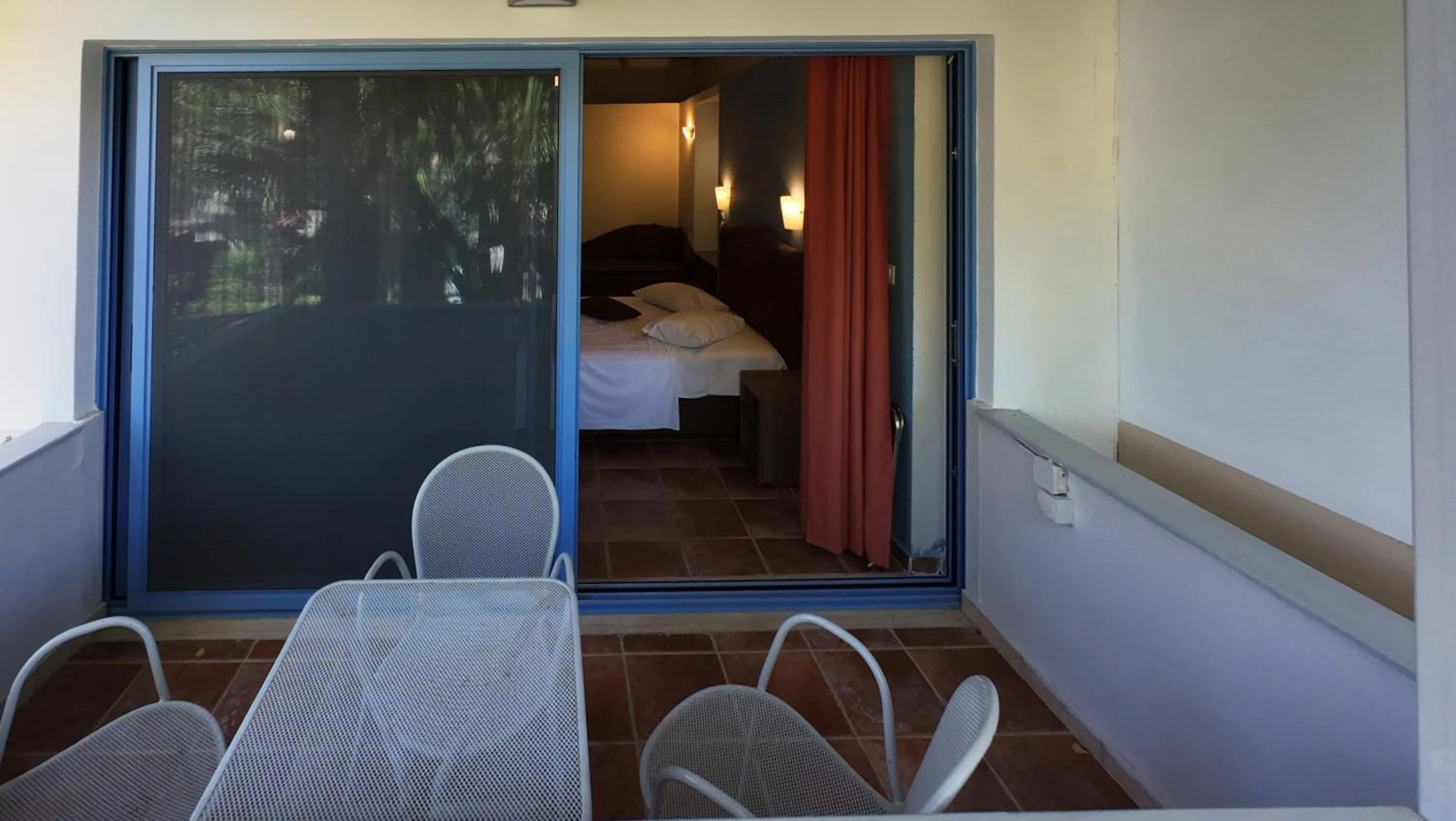 Bed in Rouda Bay Beach Hotel