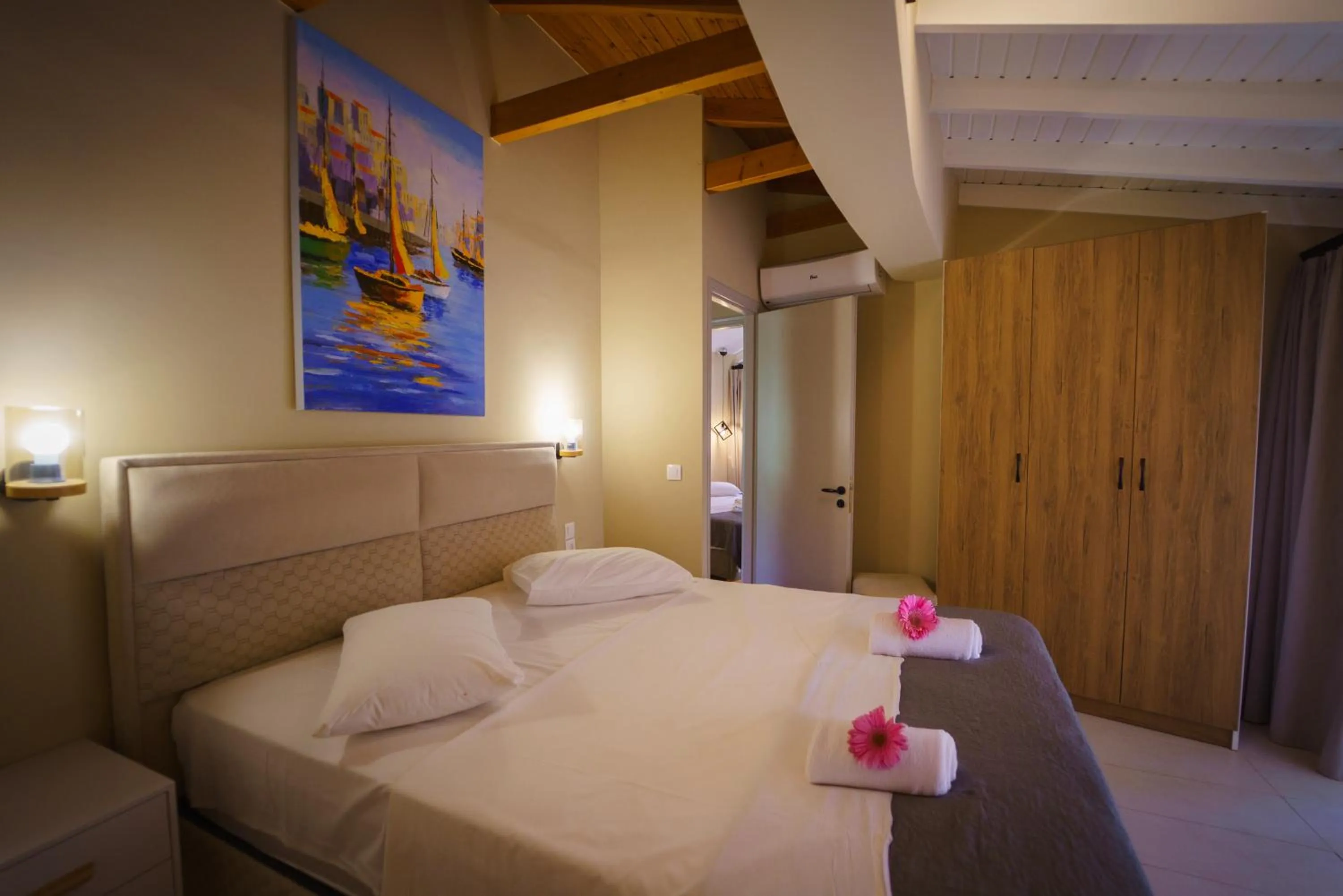 Bed in Rouda Bay Beach Hotel