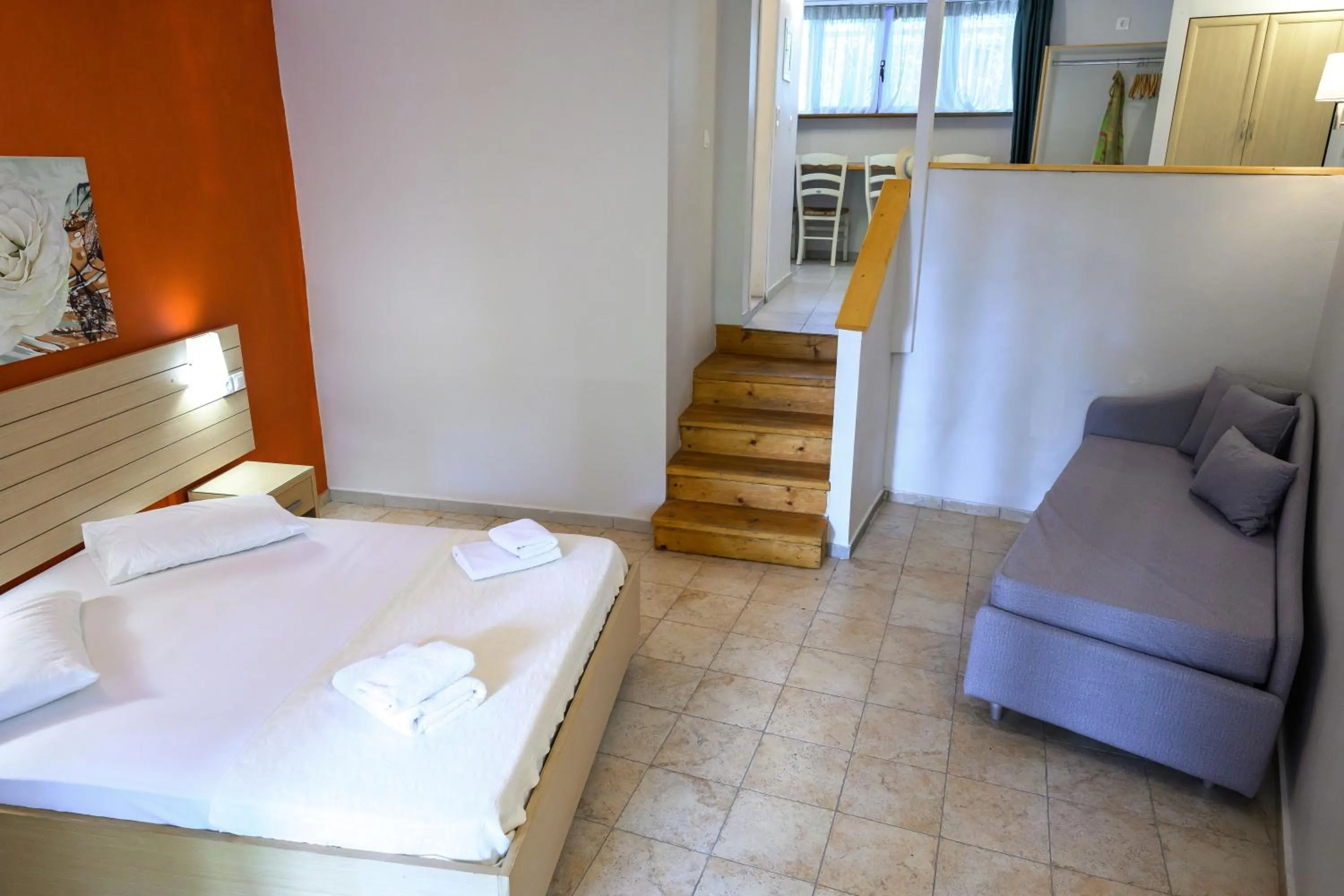 Bed in Rouda Bay Beach Hotel