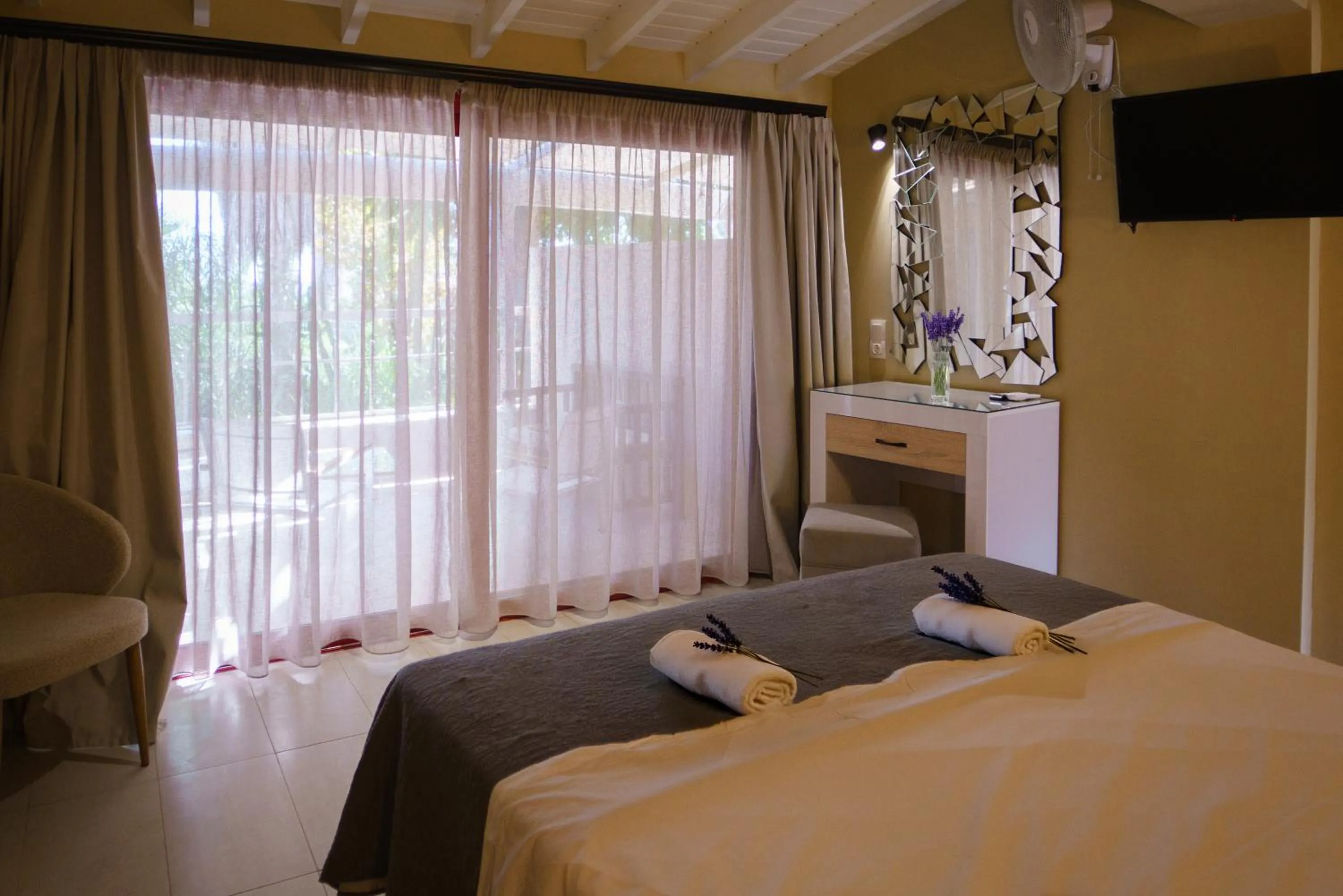 Bed in Rouda Bay Beach Hotel