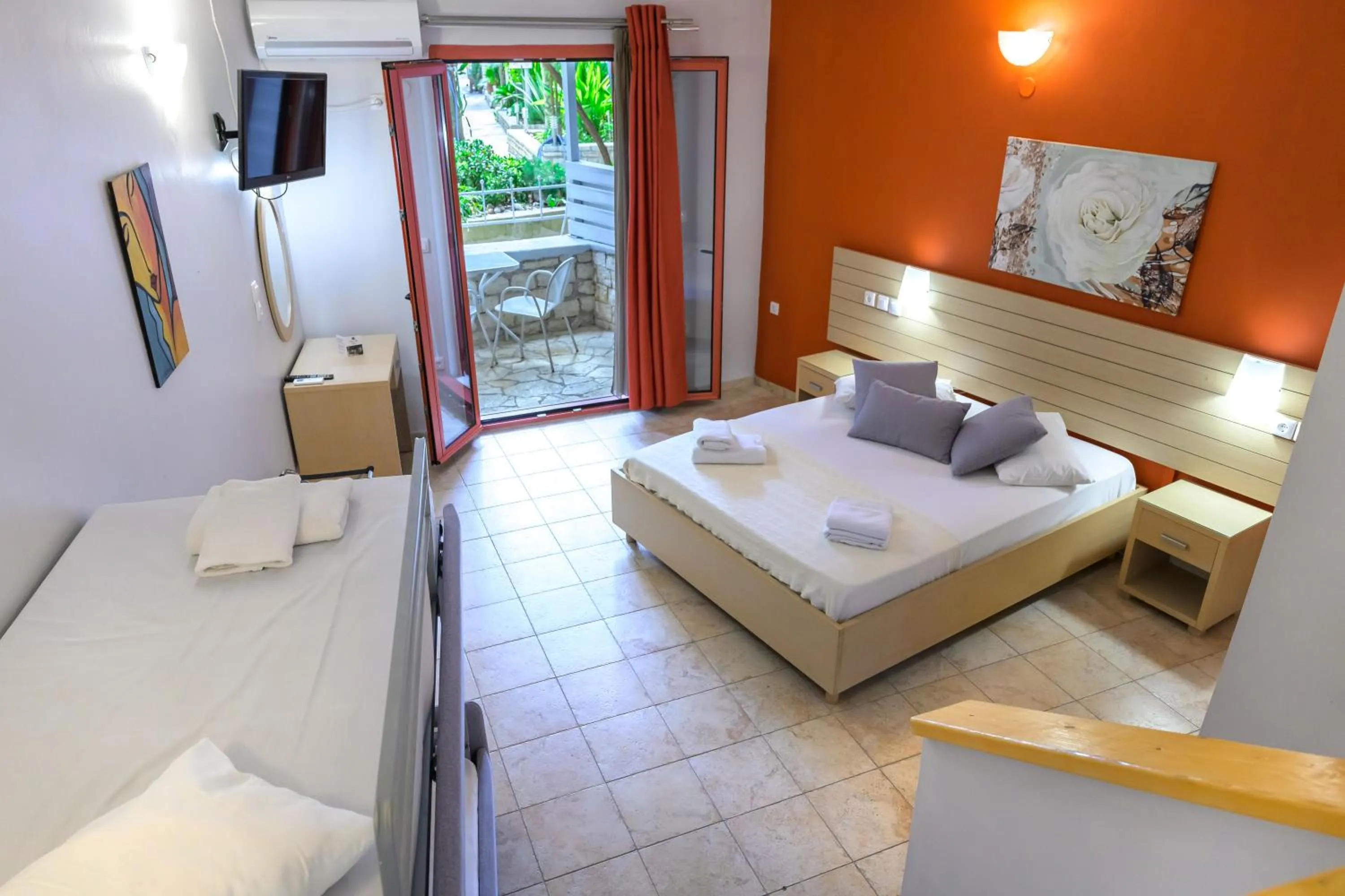 Bed in Rouda Bay Beach Hotel