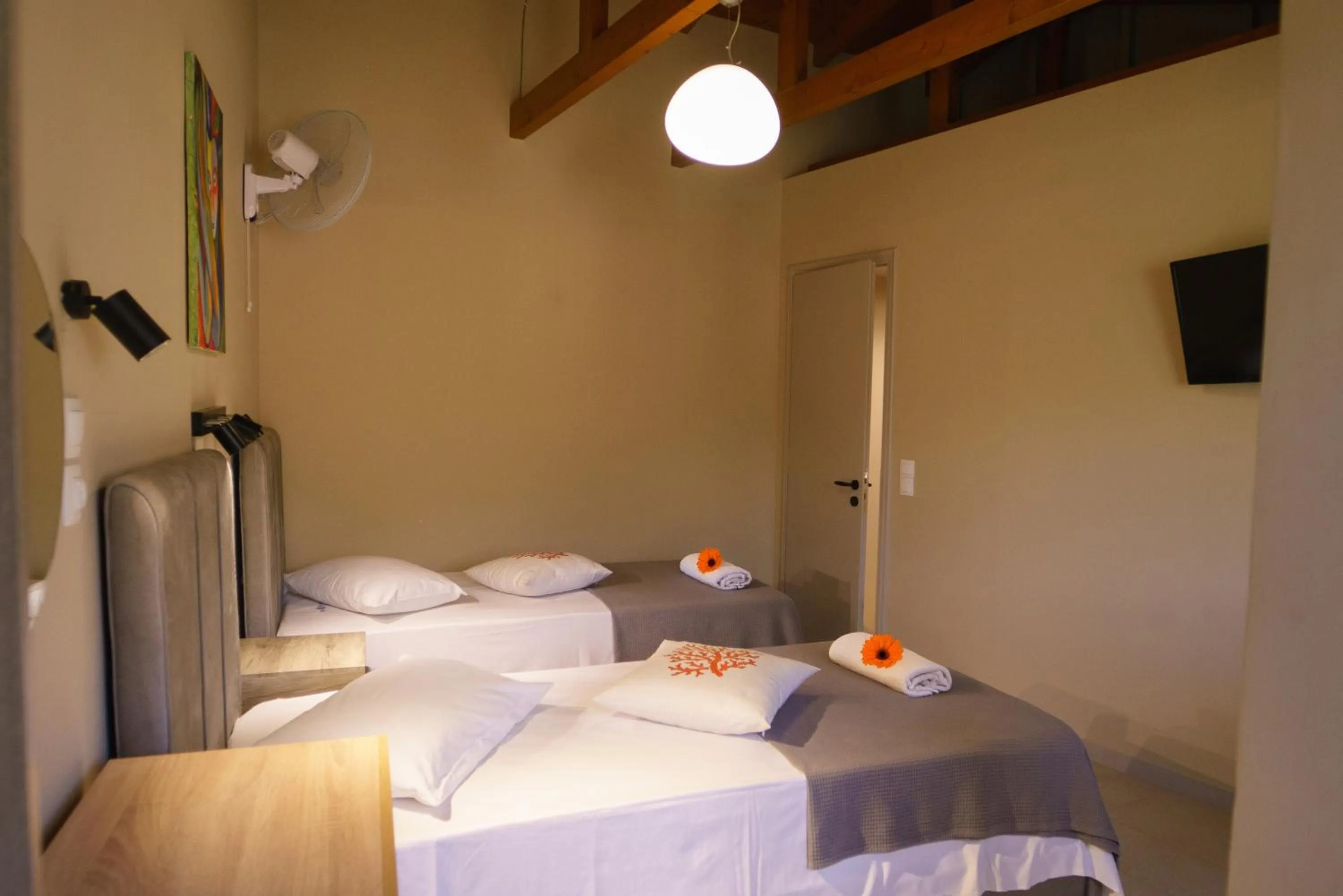 Bed in Rouda Bay Beach Hotel