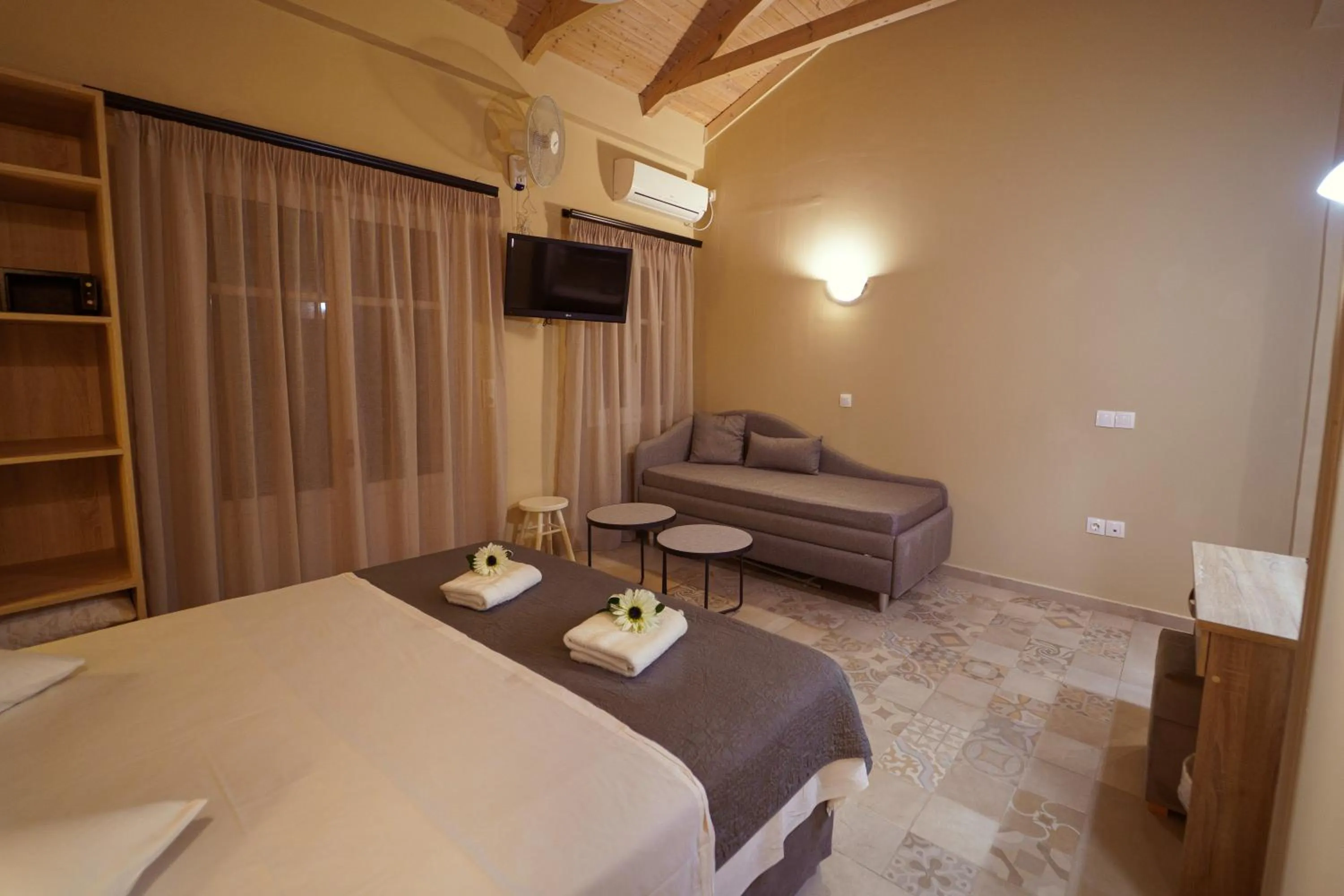 Bed in Rouda Bay Beach Hotel