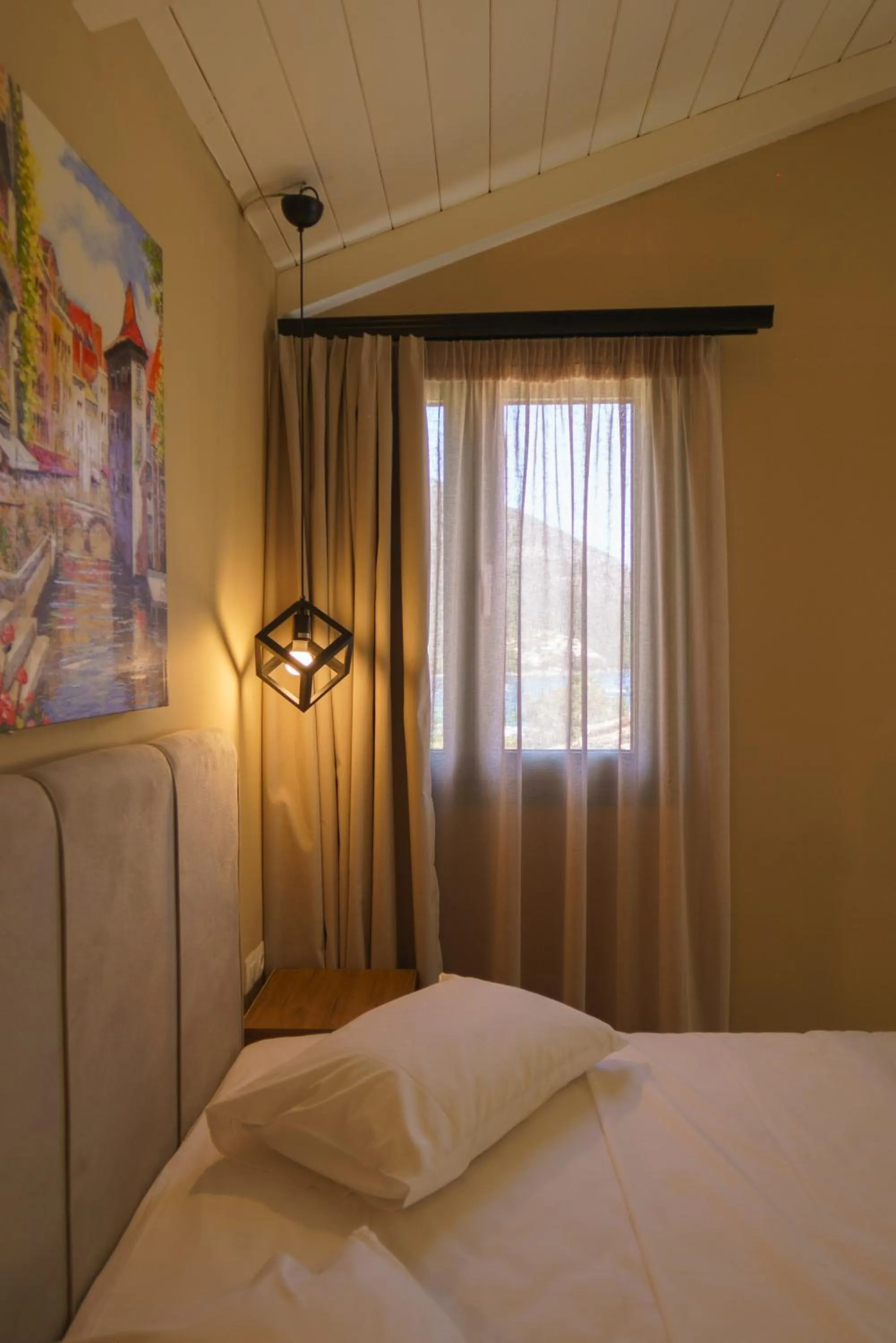 Bed in Rouda Bay Beach Hotel