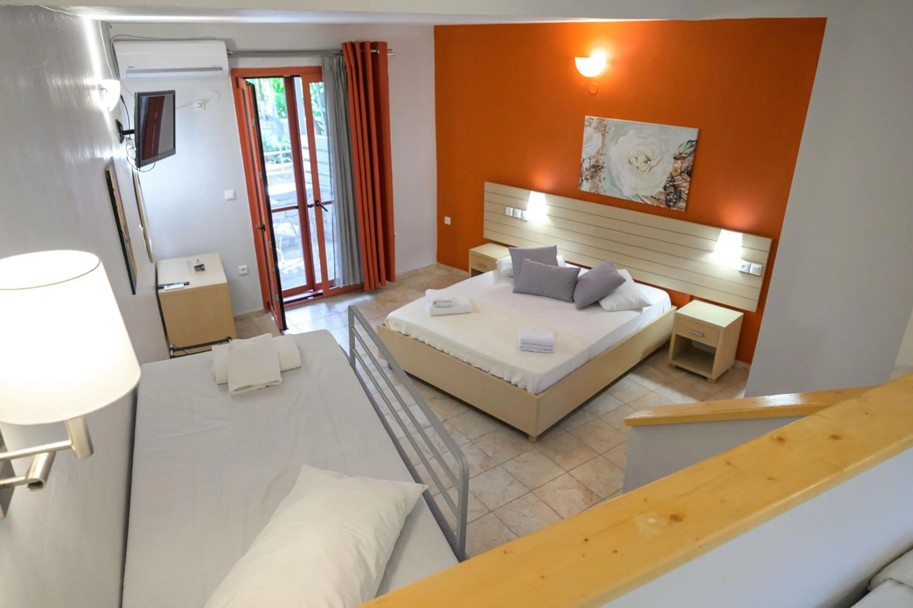 Bed in Rouda Bay Beach Hotel