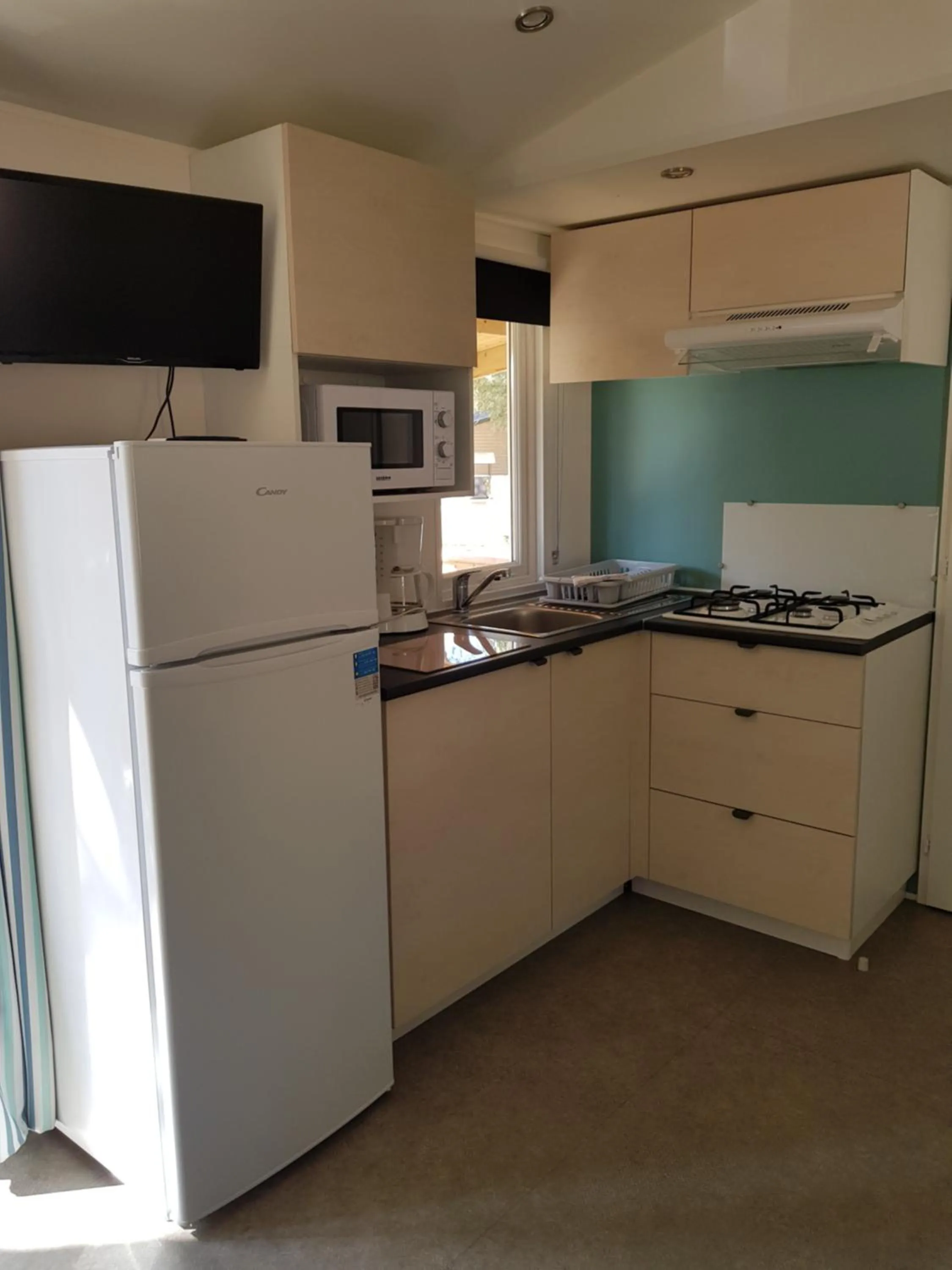 Kitchen or kitchenette in Camping La Pinède