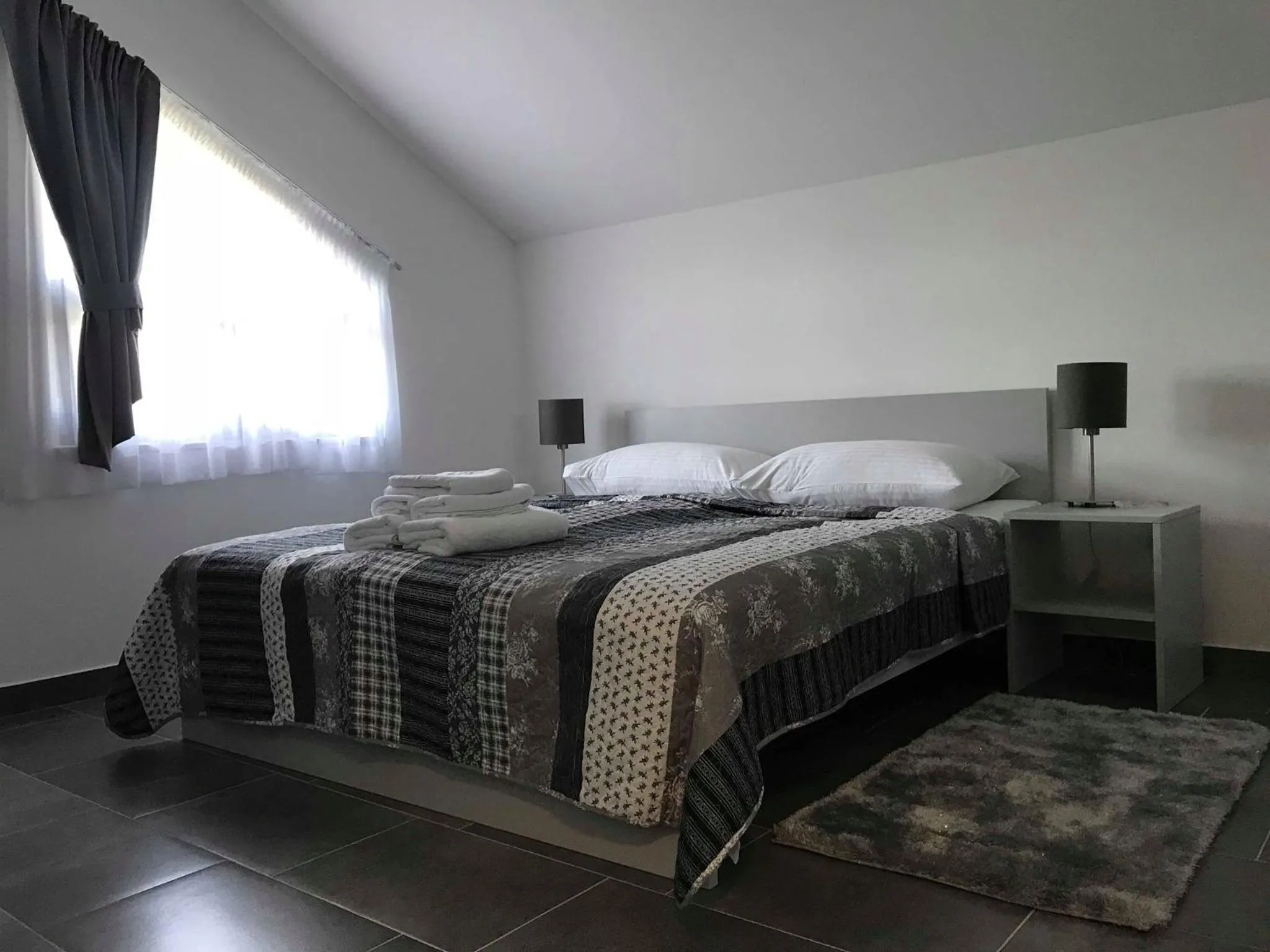 Bed in Filipovic rent a car & apartments