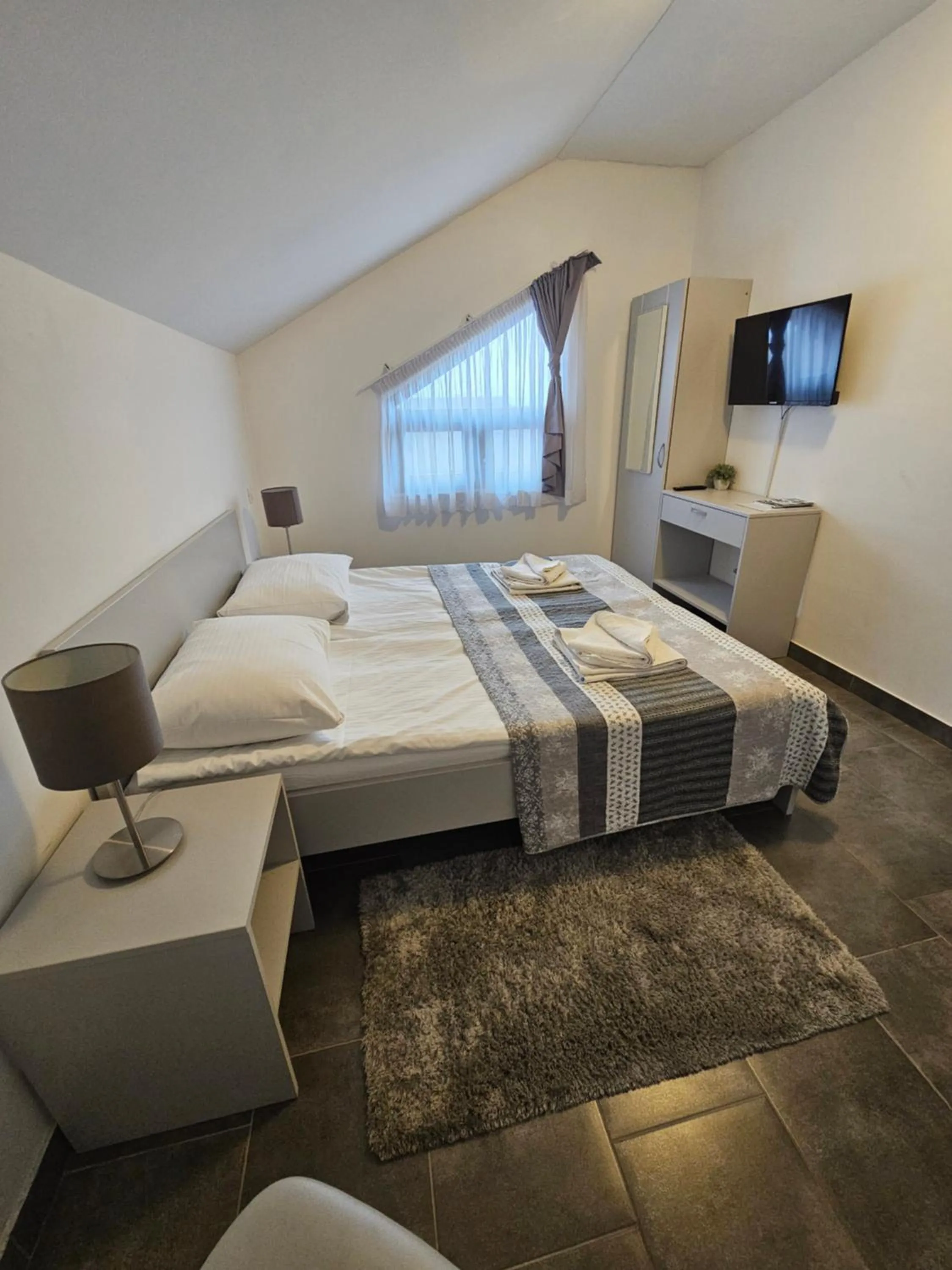 Bed in Filipovic rent a car & apartments