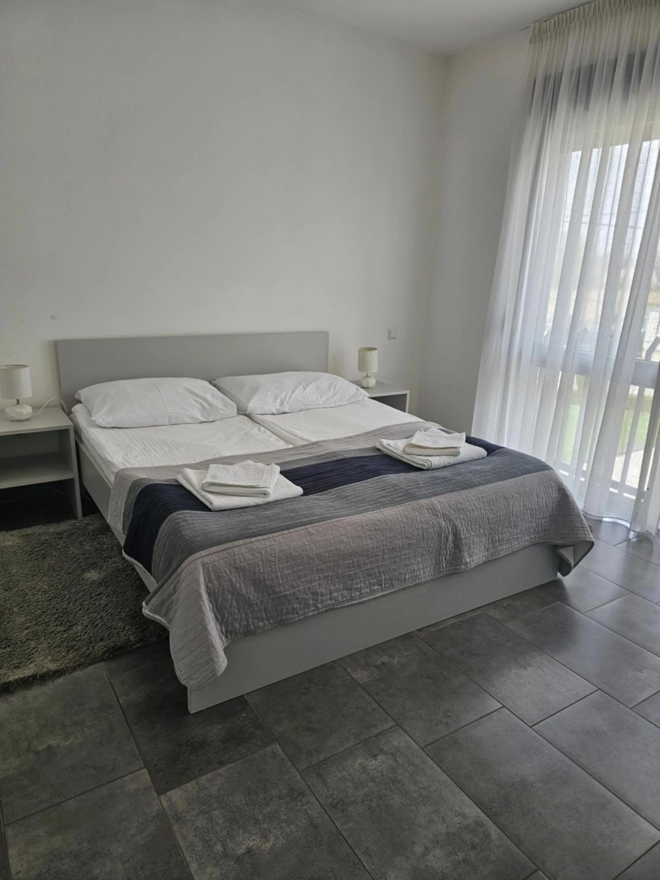 Bed in Filipovic rent a car & apartments