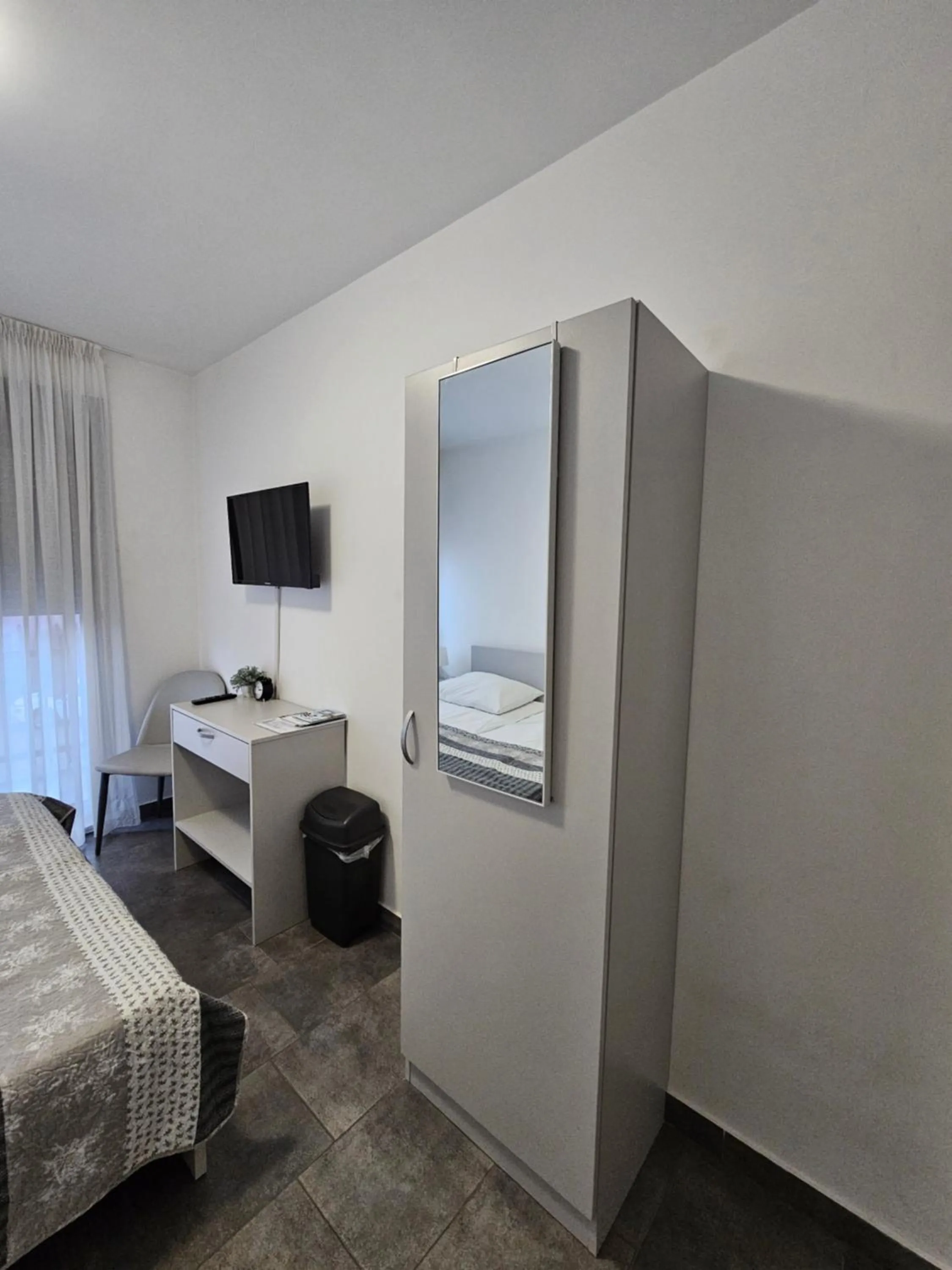 TV and multimedia, Bed in Filipovic rent a car & apartments