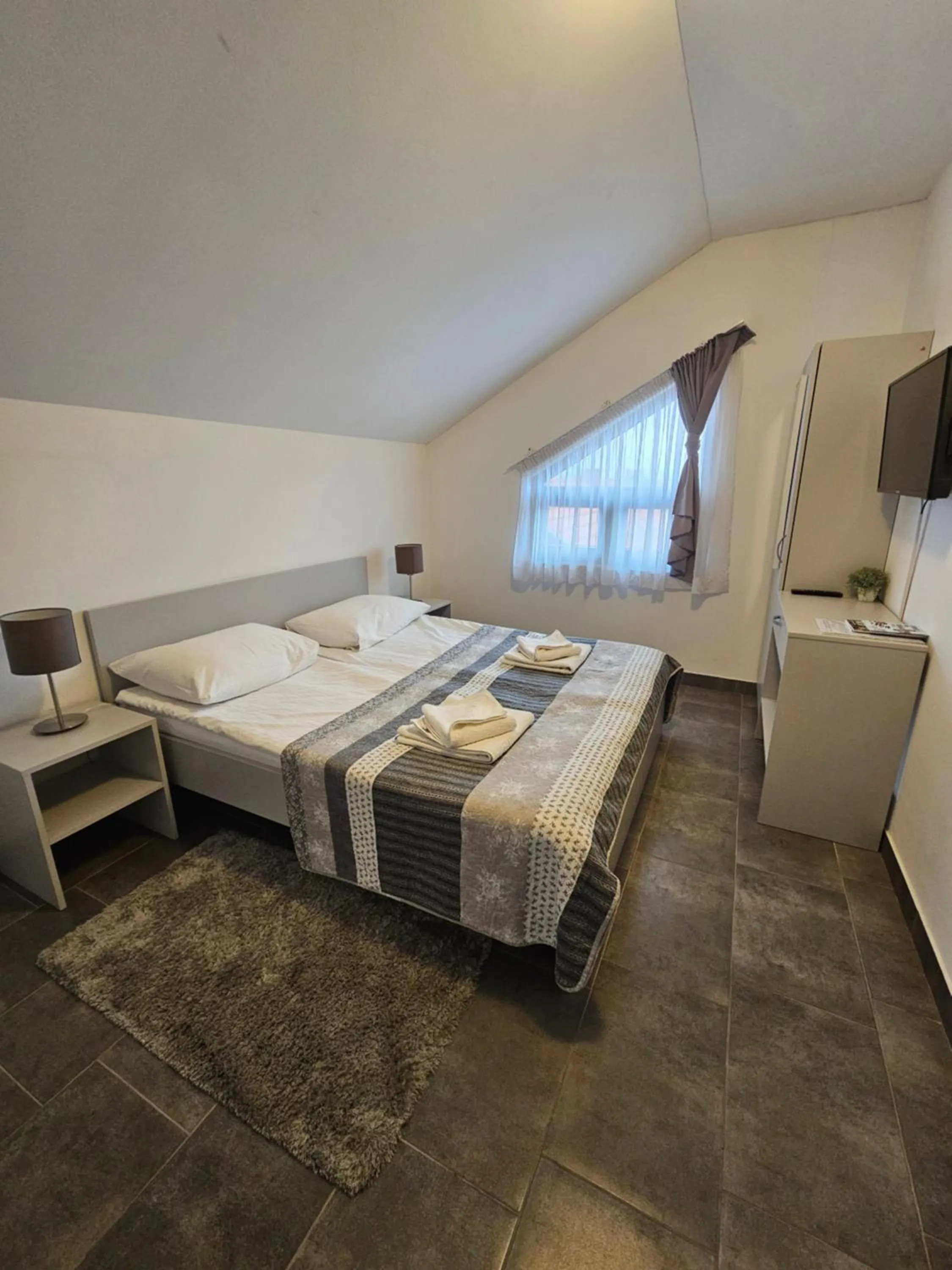 Bed in Filipovic rent a car & apartments