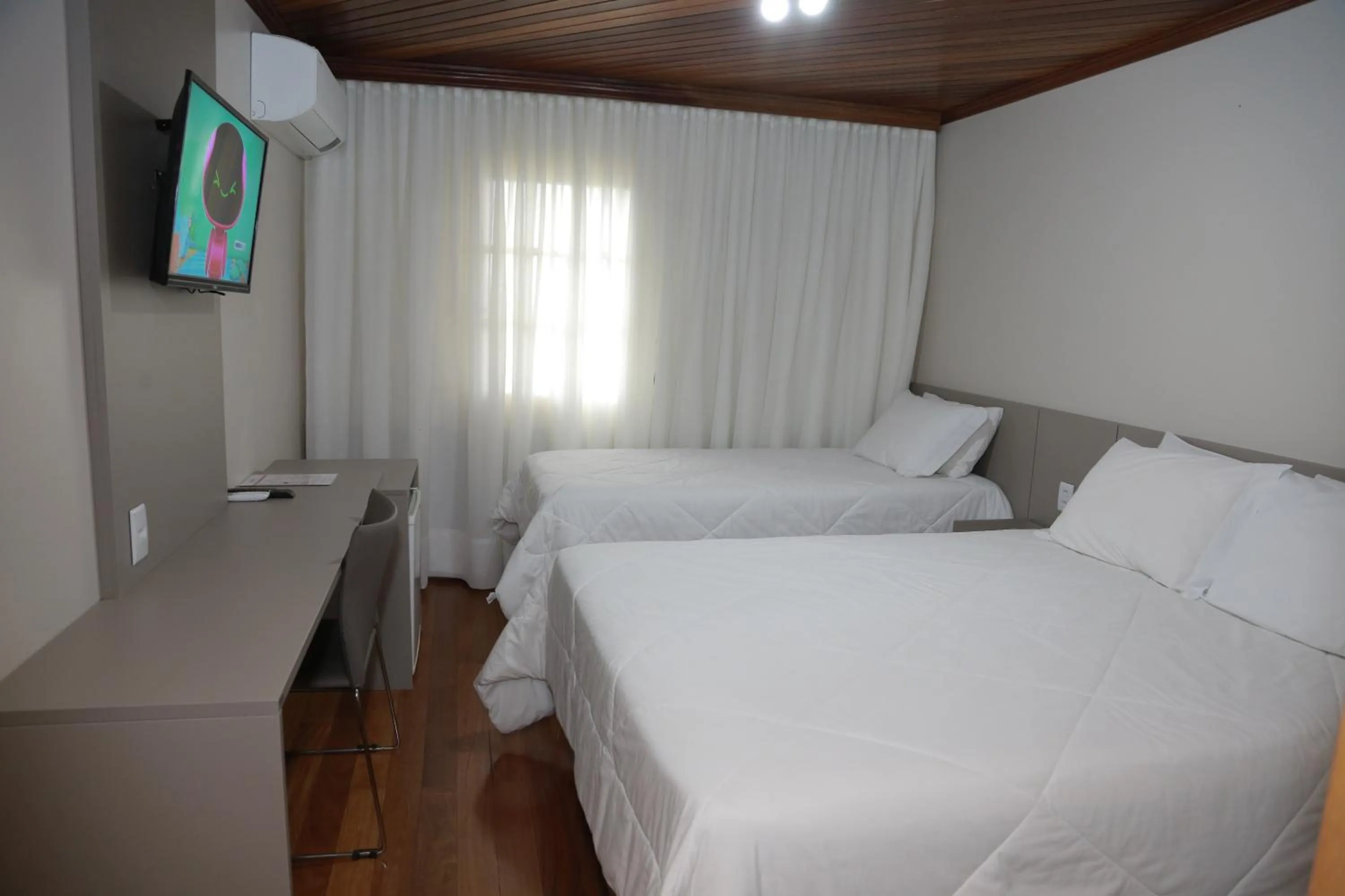 Photo of the whole room, Bed in Letto Hotel Flores da Cunha