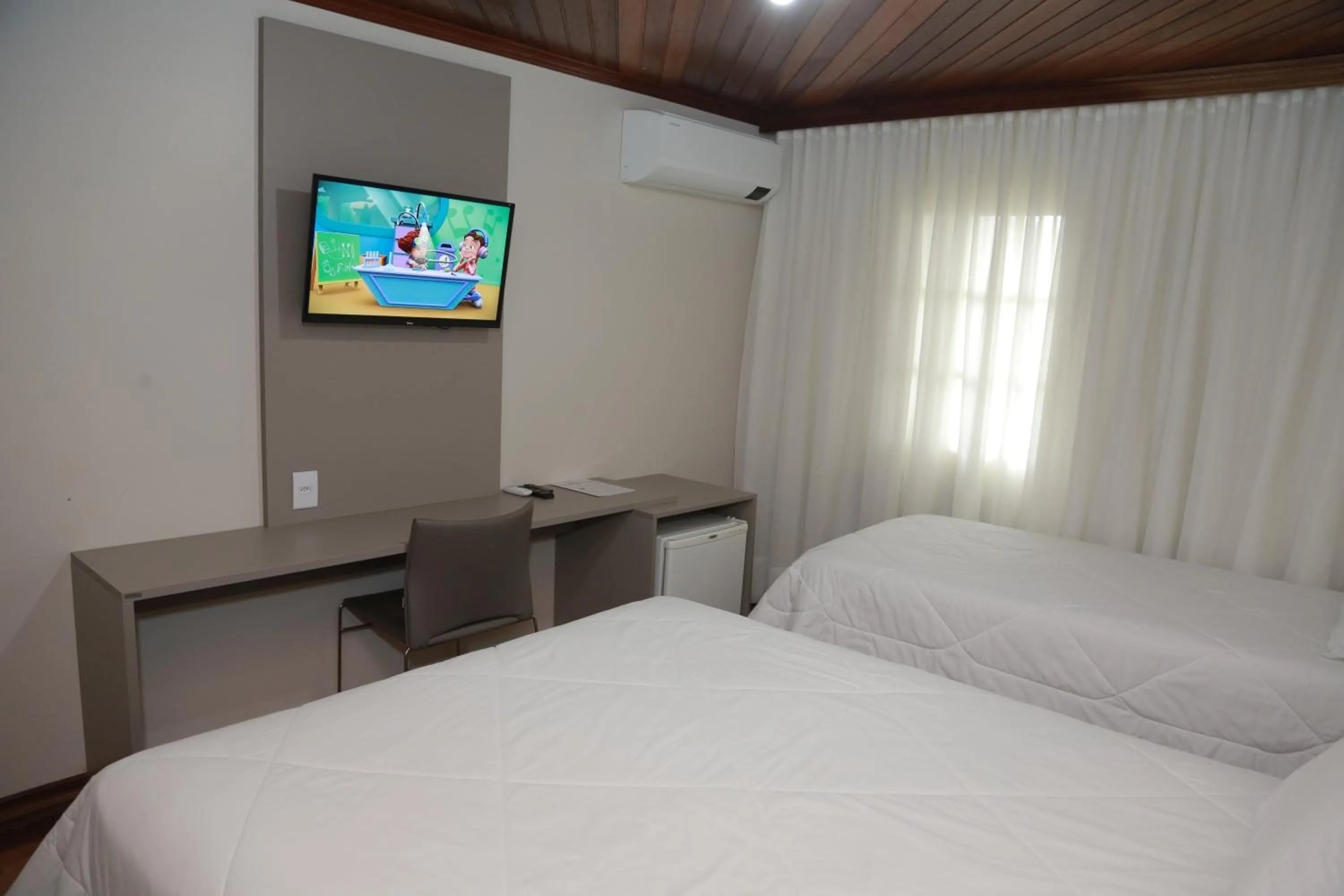TV and multimedia, Bed in Letto Hotel Flores da Cunha