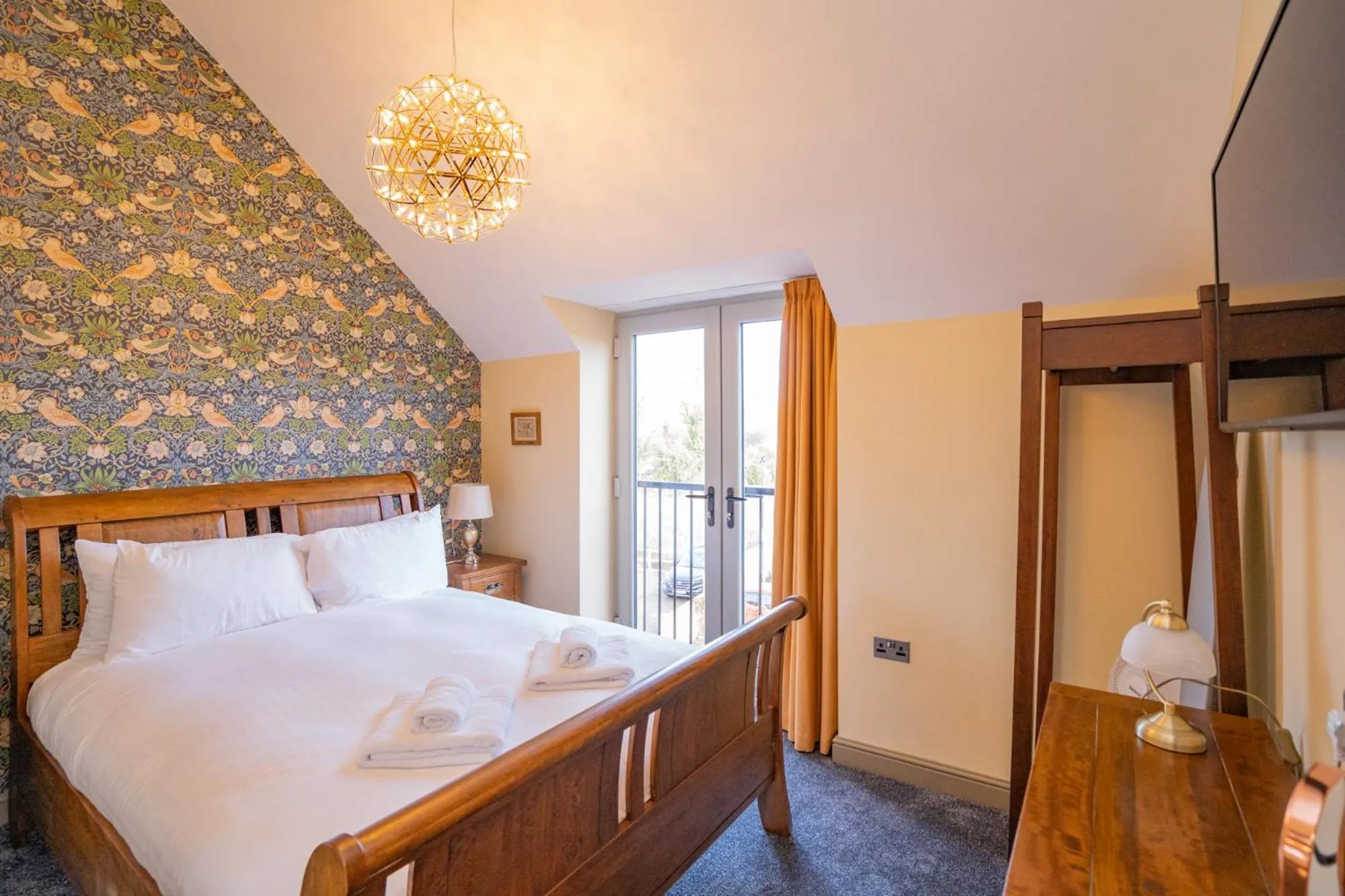 Bed in The Angel Inn Hotel