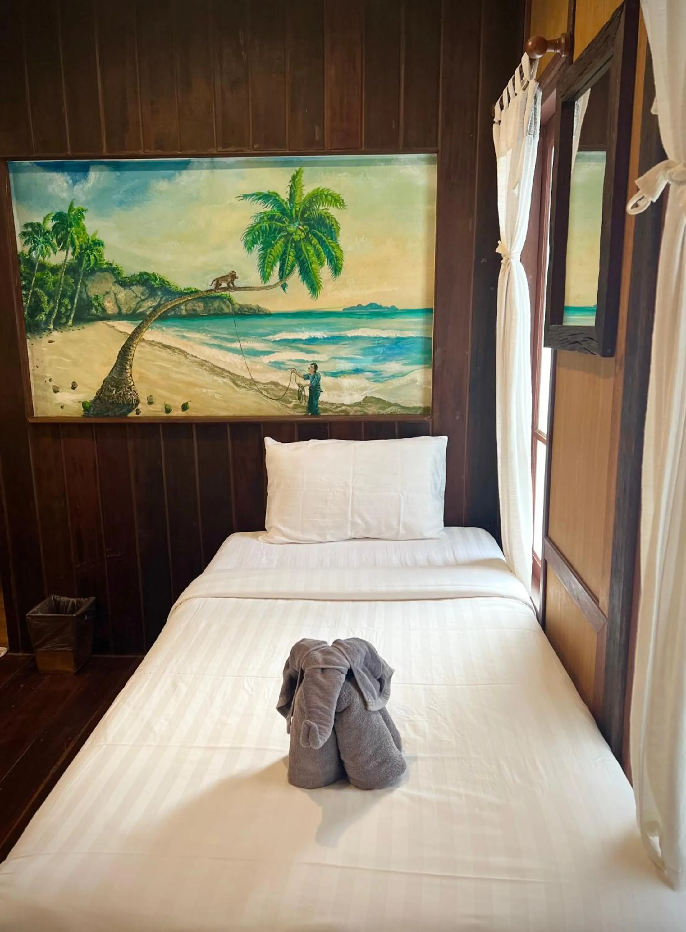 Bed in V-View Beach Resort