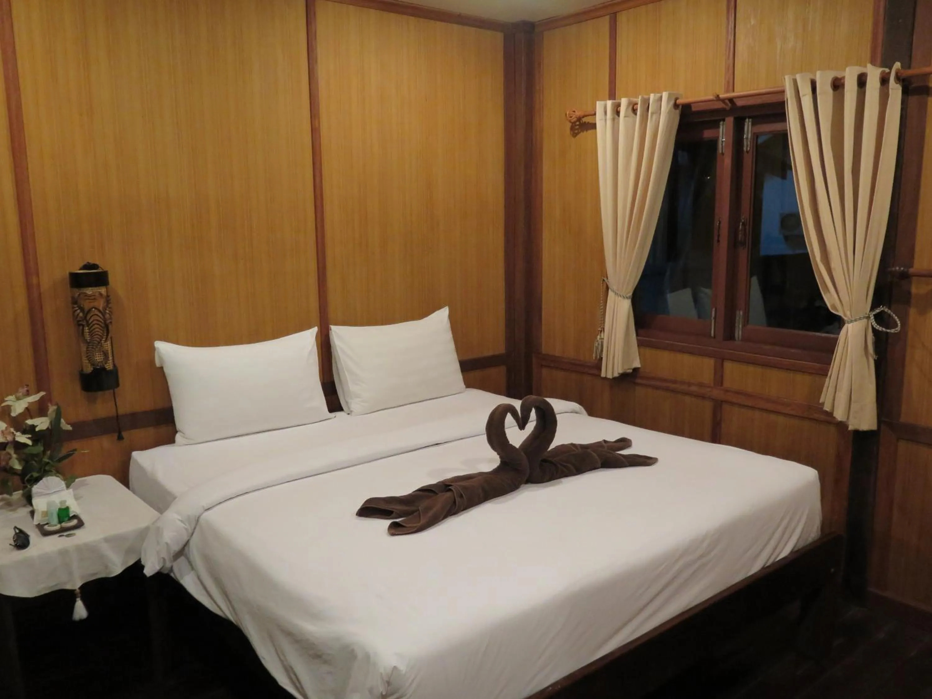 Bed in V-View Beach Resort