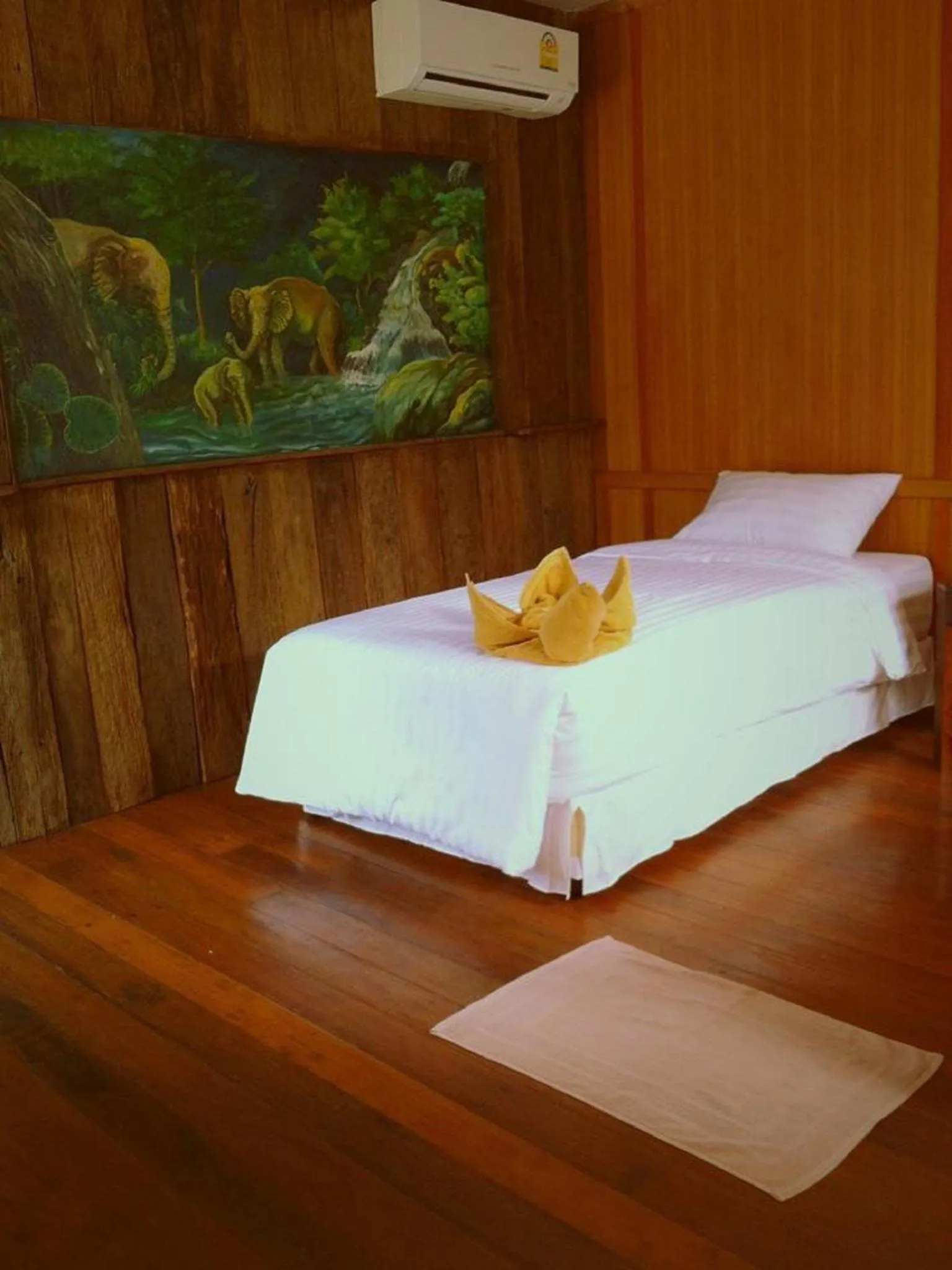 Bed in V-View Beach Resort