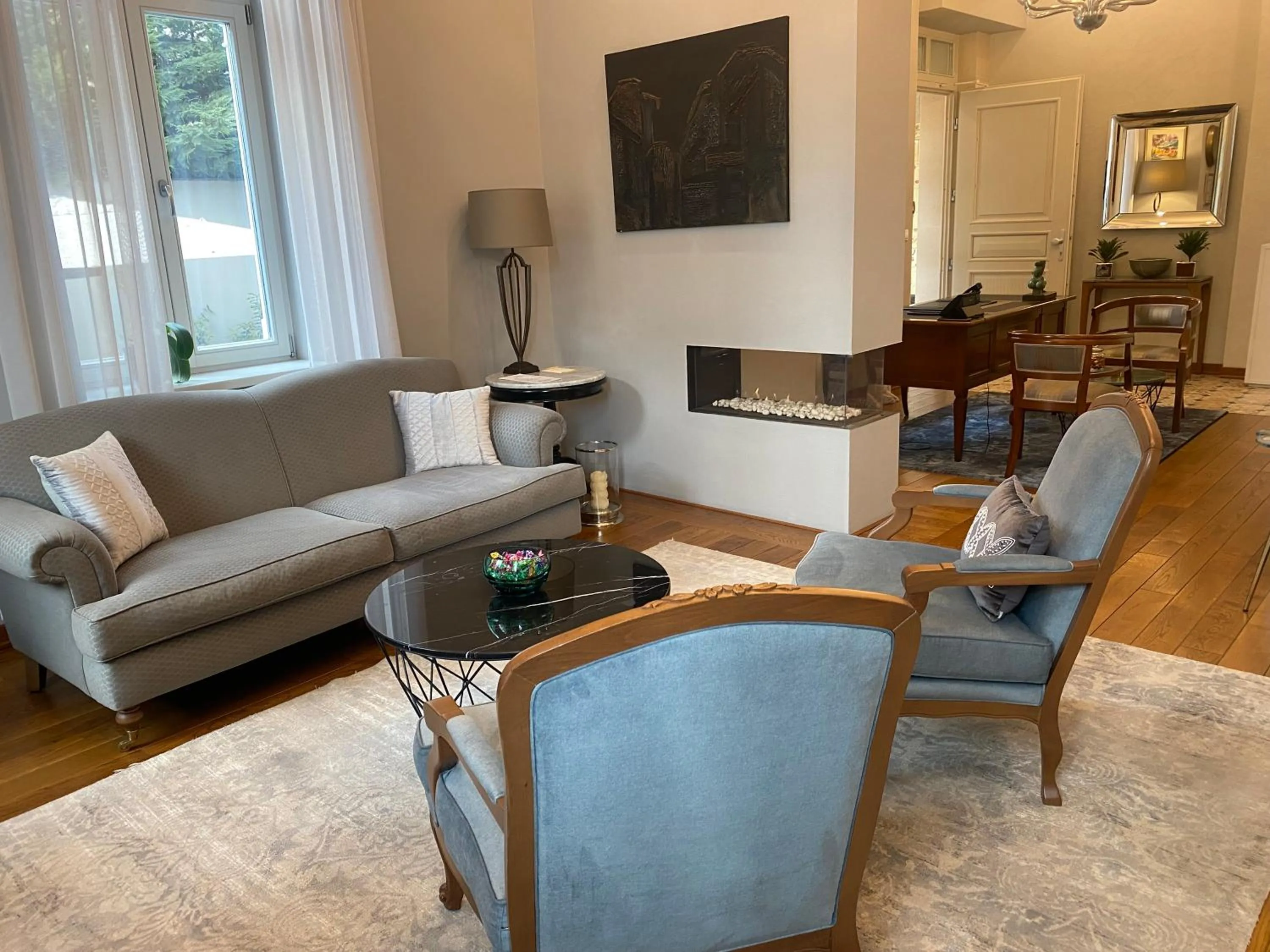 Communal lounge/ TV room in Villa Promenade