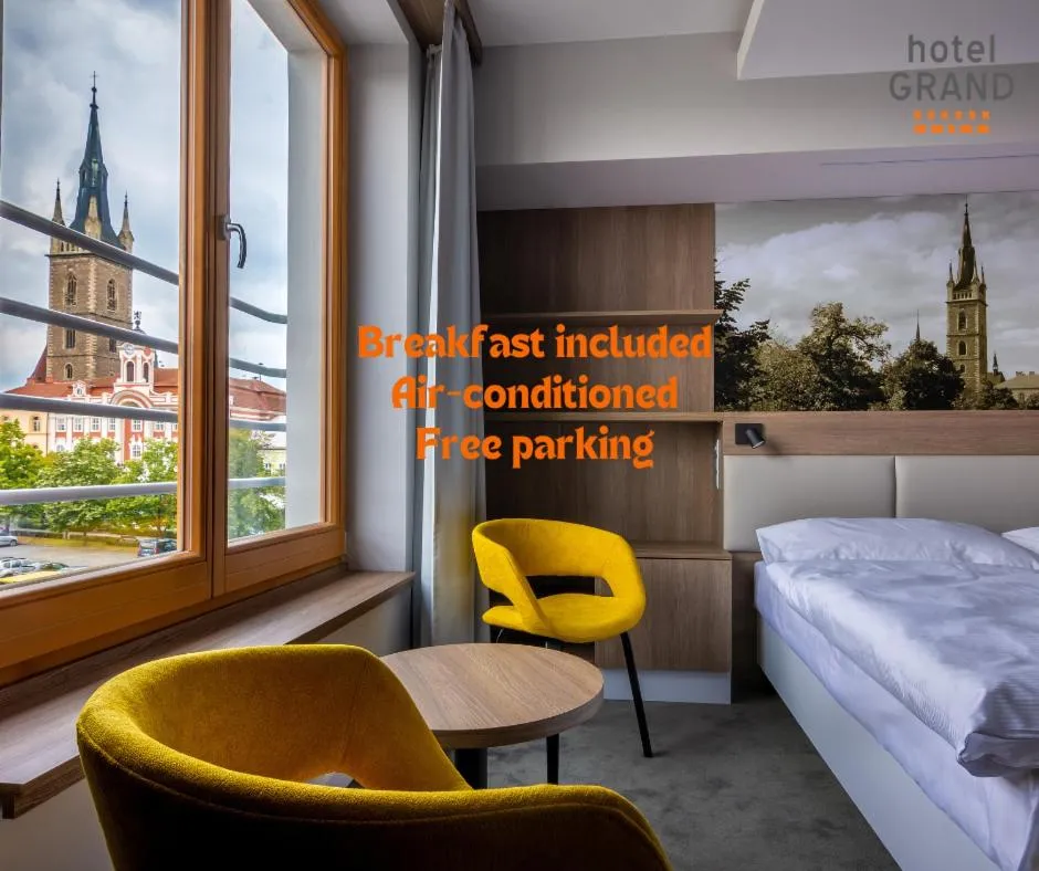 View (from property/room), Bed in Hotel Grand