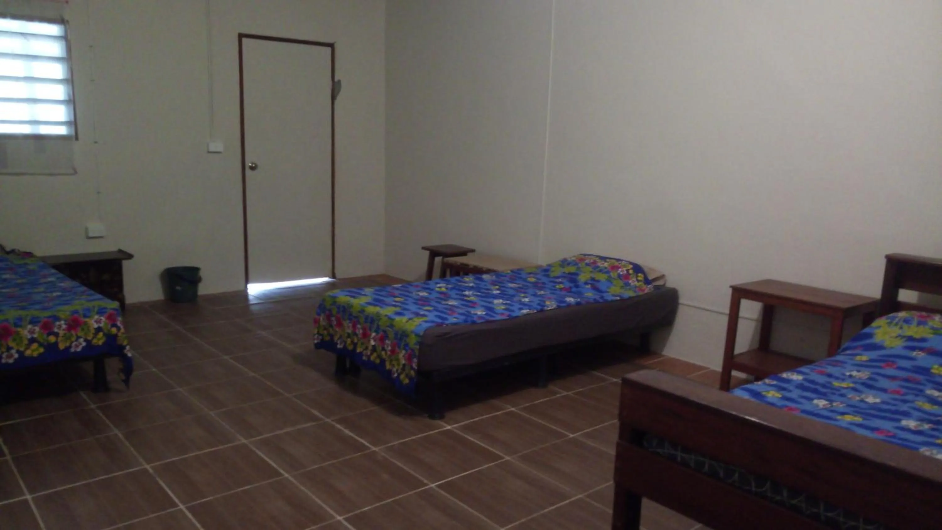 Bed in Bluepango Guest House