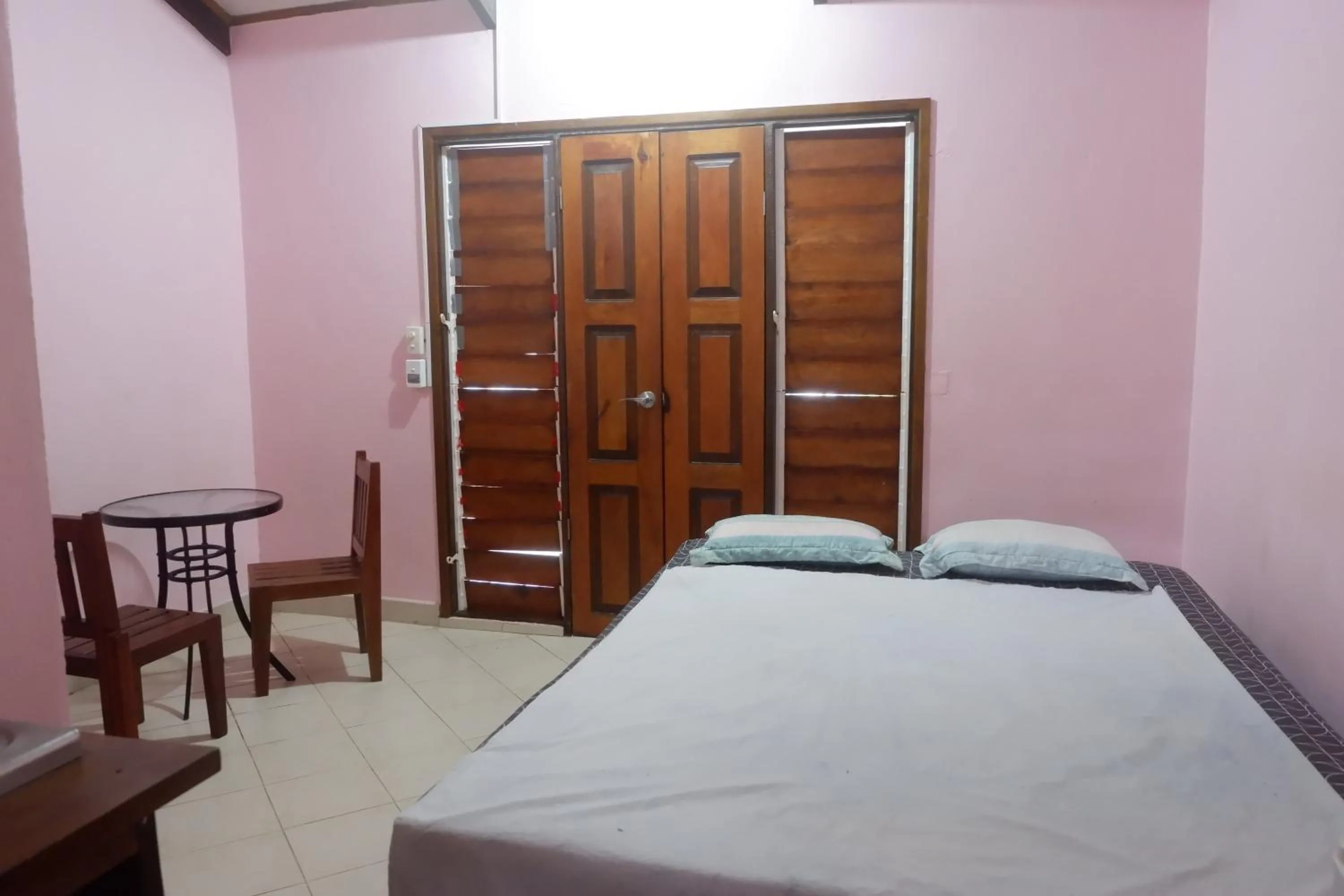 Bed in Bluepango Guest House