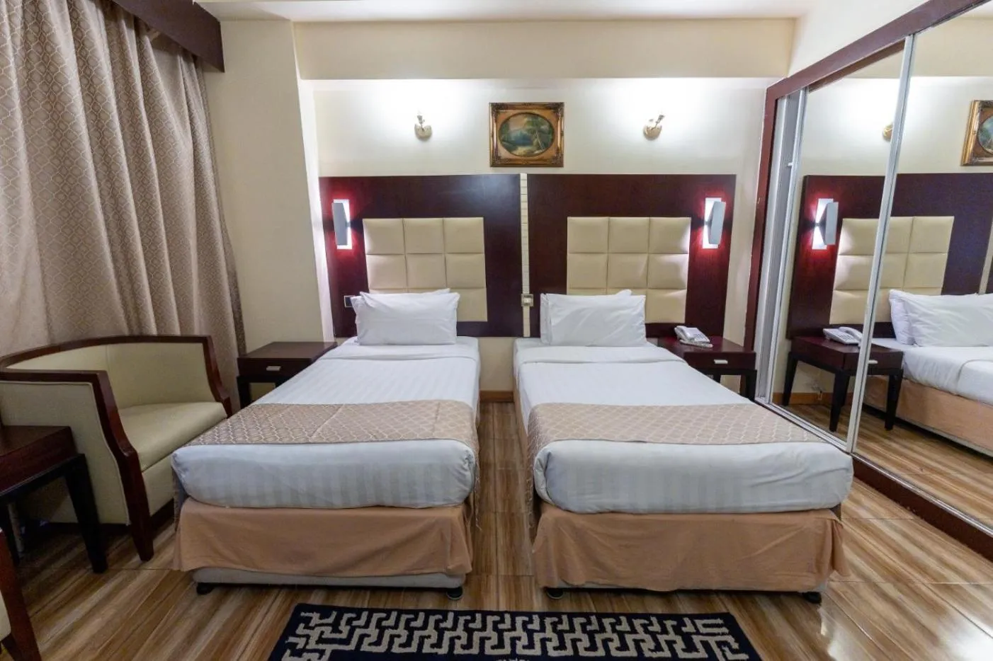 Bed in Sun & Sands Sea View Hotel