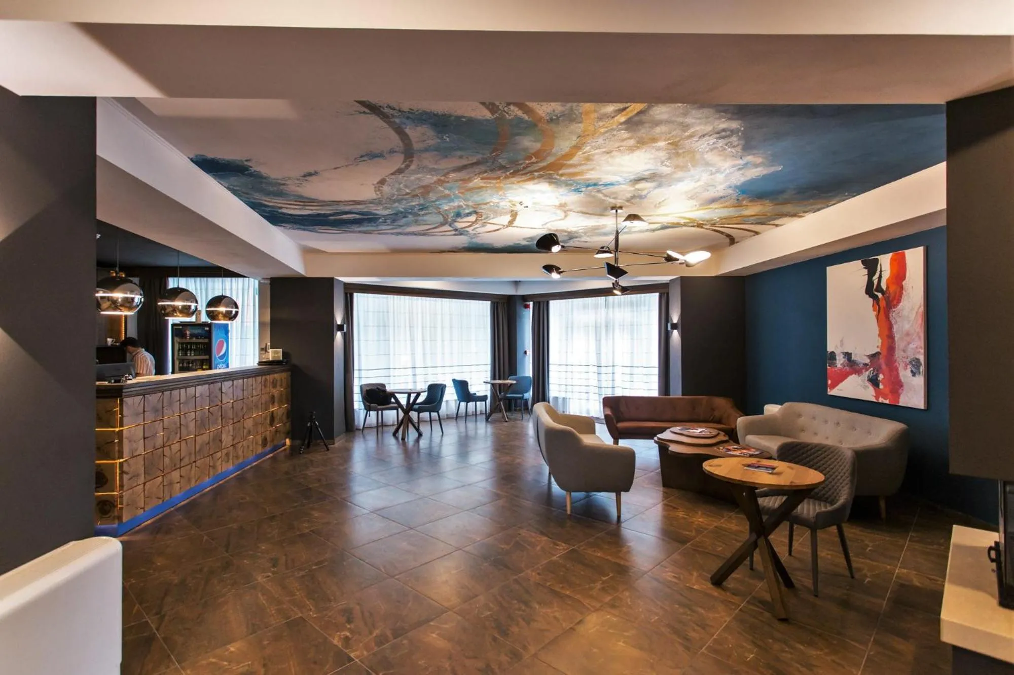 Communal lounge/ TV room in Panorama Boutique Hotel