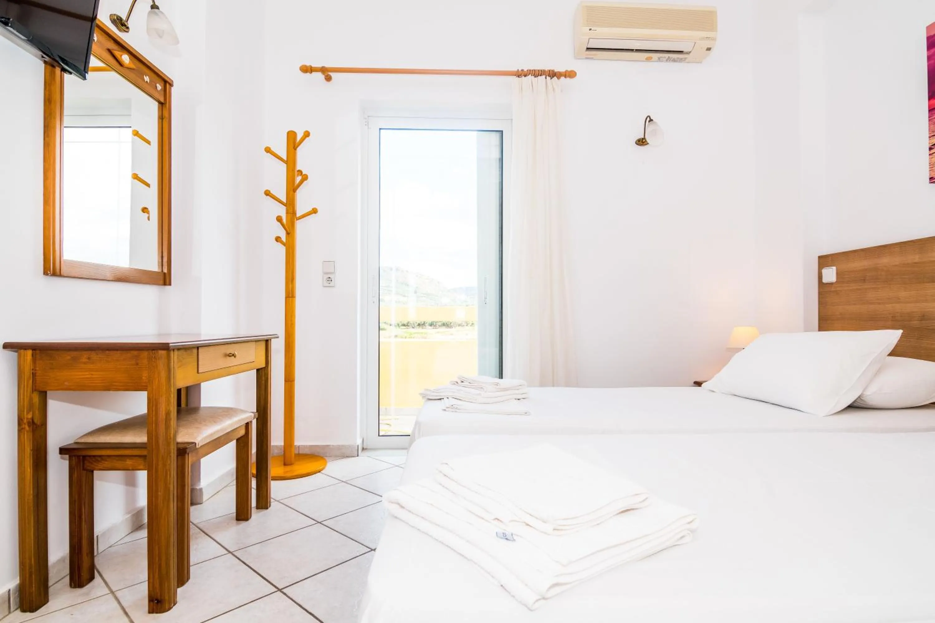 Bed in Thalassa Apartments