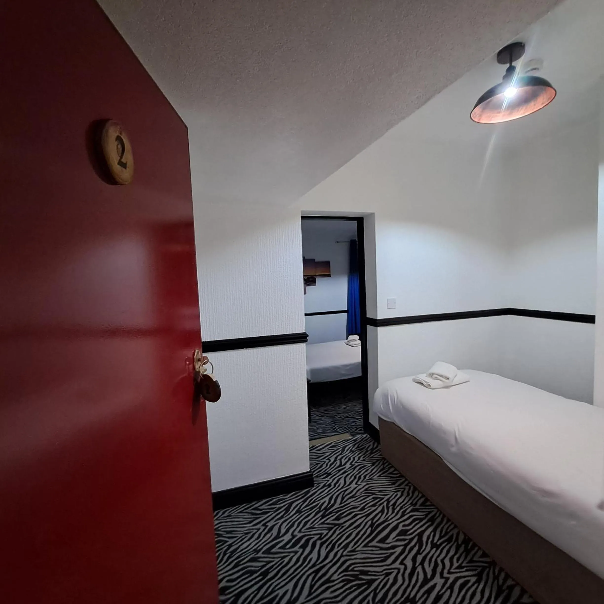 Bed in Boathouse Hotel