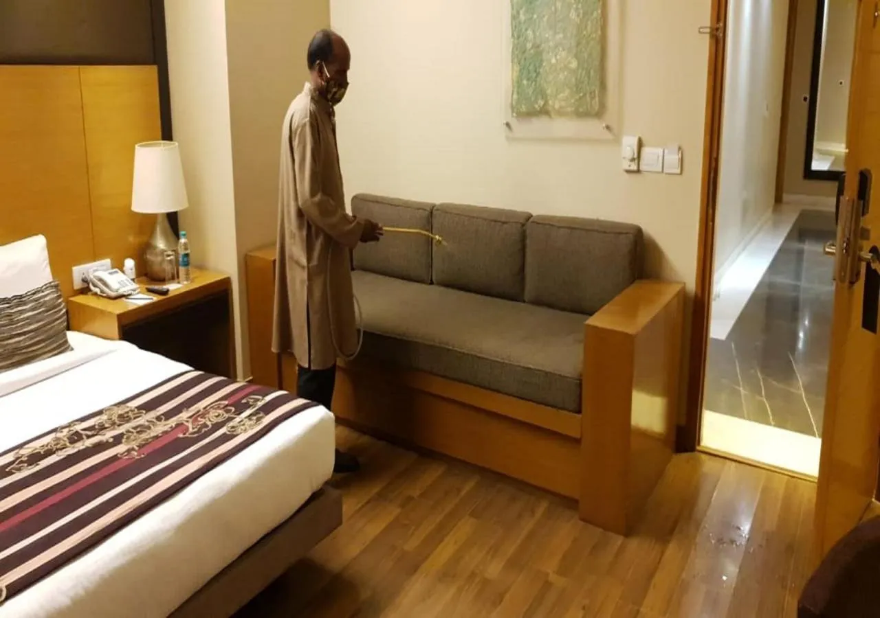 Staff, Bed in Udman Hotel Panchshila Park