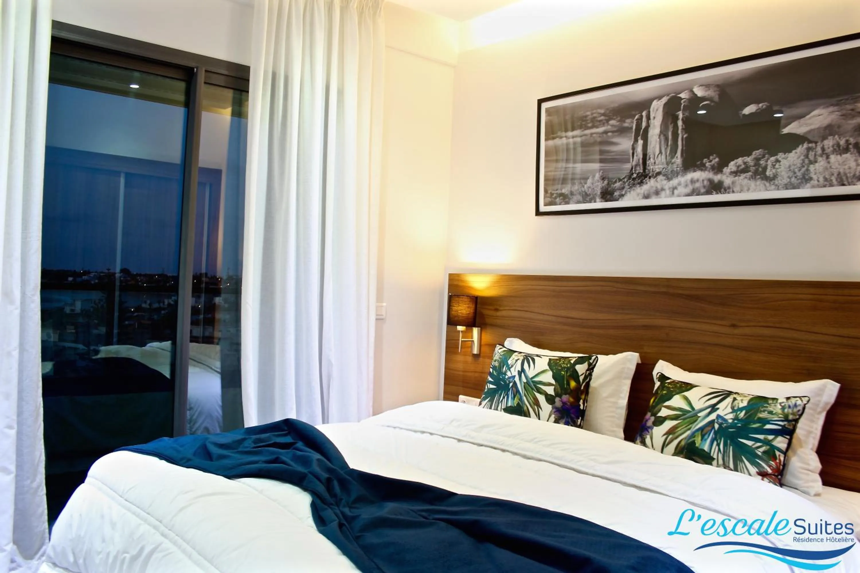 Bed in L'escale Suites Résidence Hôtelière By 7AV HOTELS