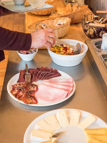 Breakfast in Hôtel Restaurant Les Alpins