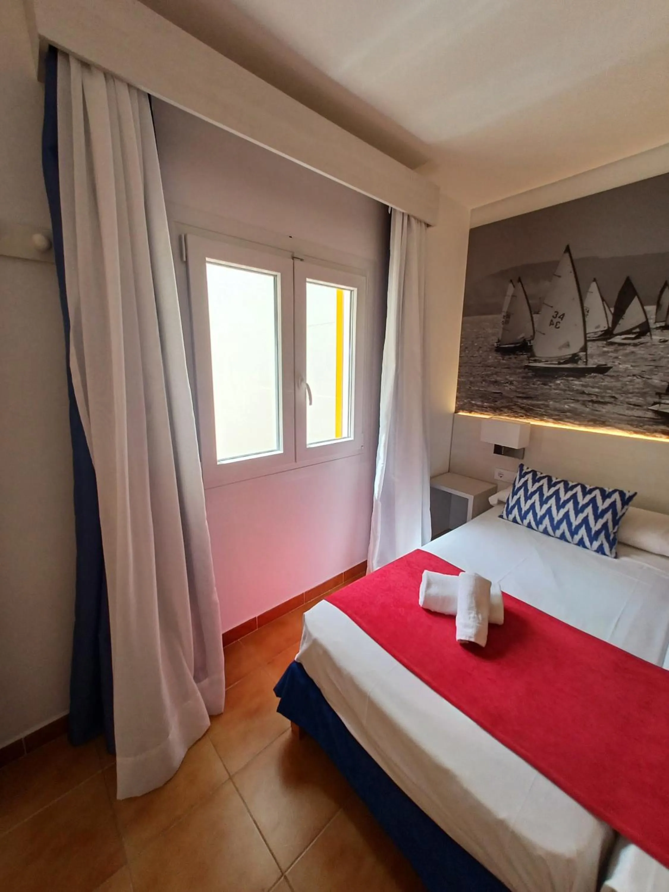 Photo of the whole room, Bed in Hostal Cala Ratjada