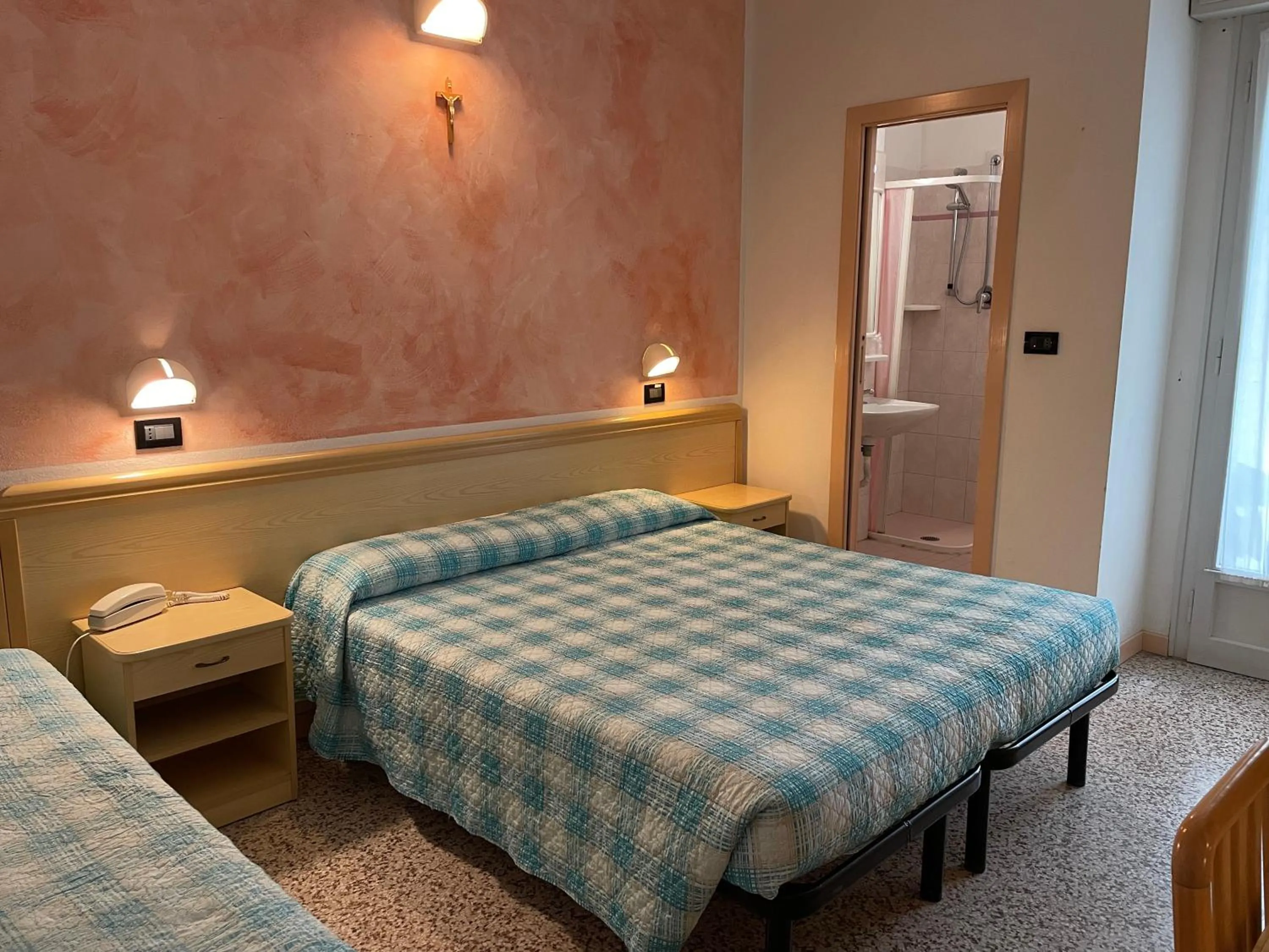 Bed in Piccolo Hotel