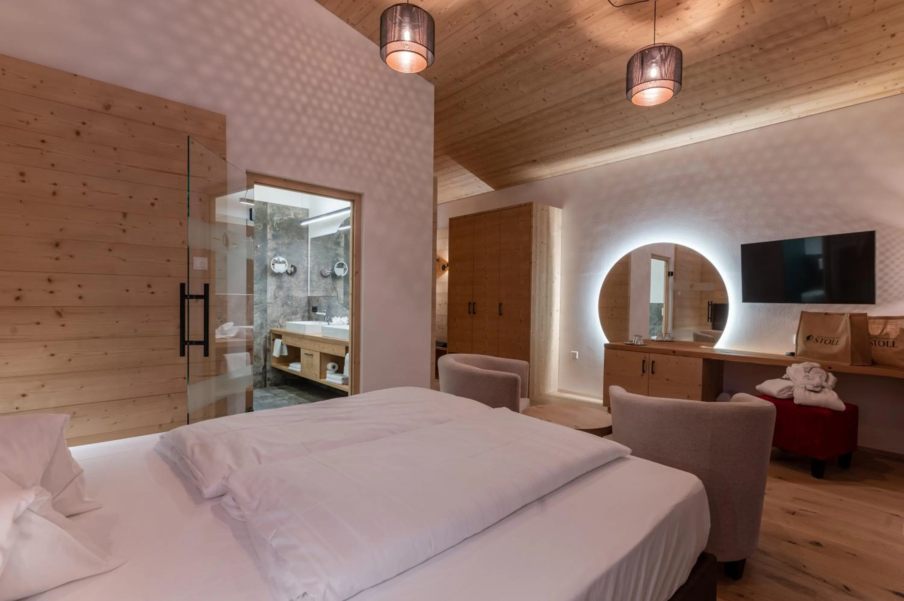 Photo of the whole room, Bed in Alpine Nature Hotel Stoll