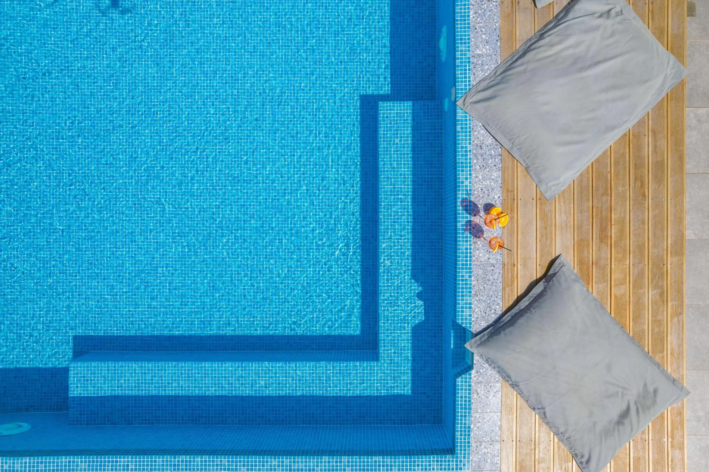 Swimming pool, Bed in Glow Boutique Hotel & Suites