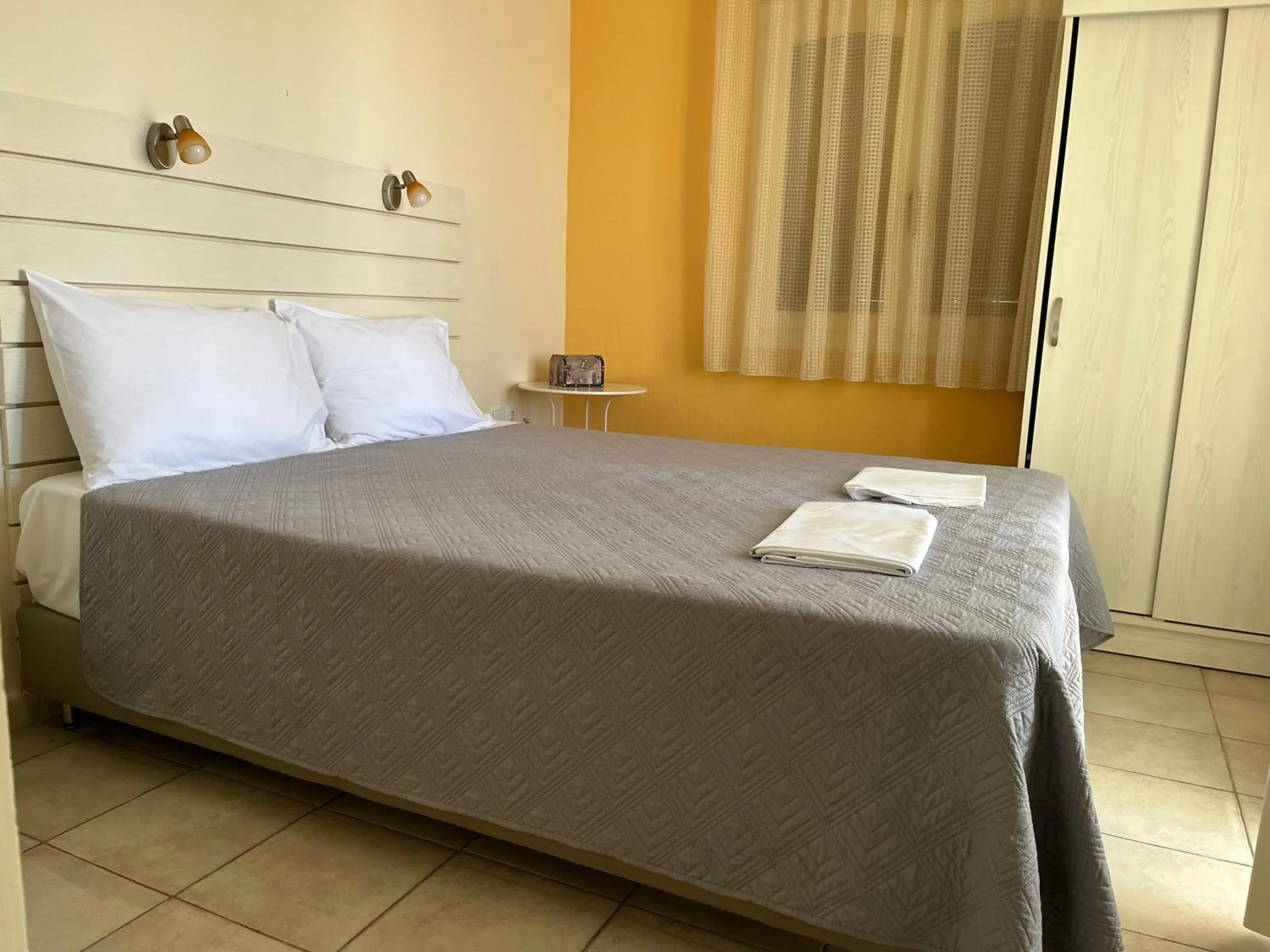 Bed in Anatoli Apartments Polichrono