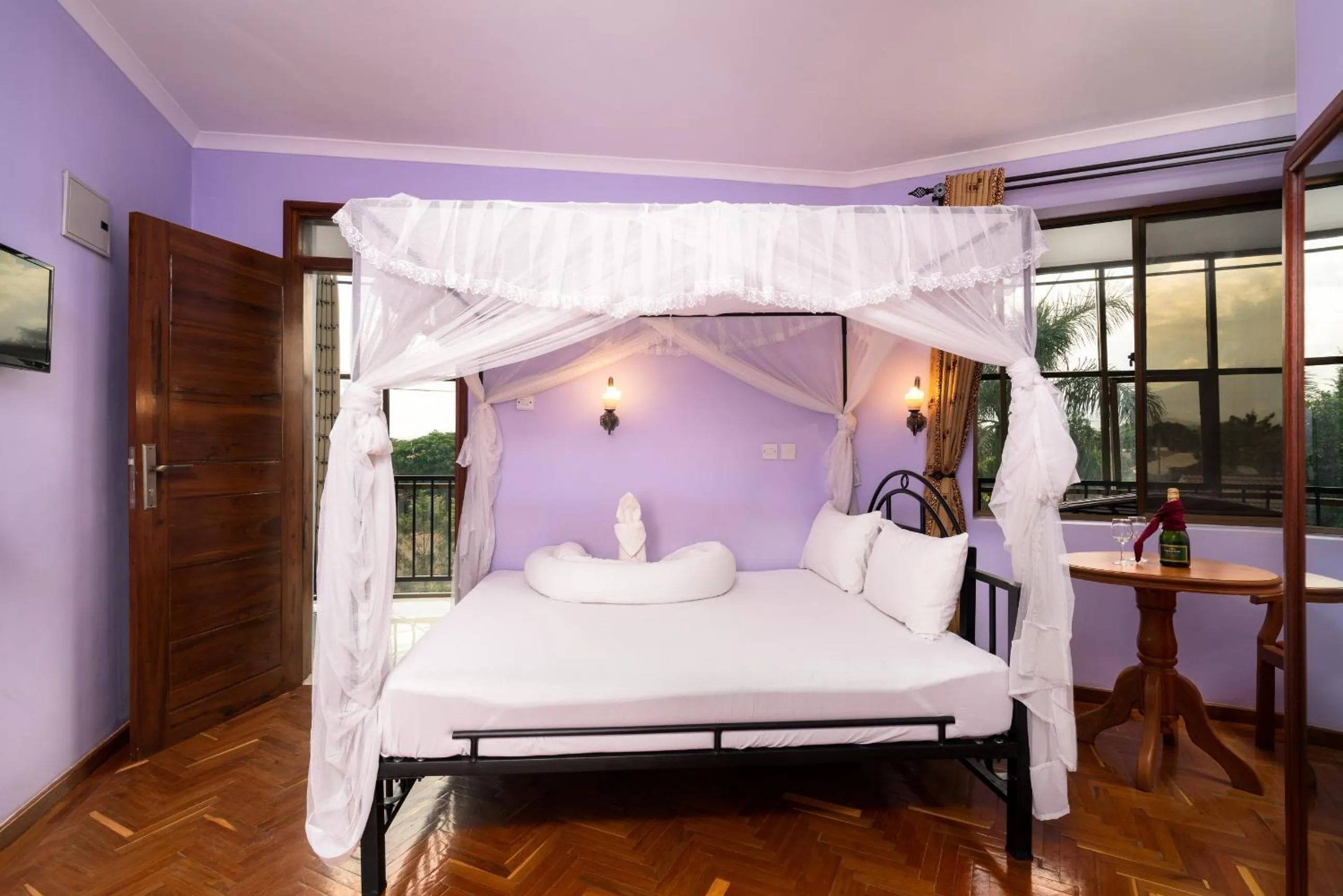 Bed in Mrimba Palm Hotel