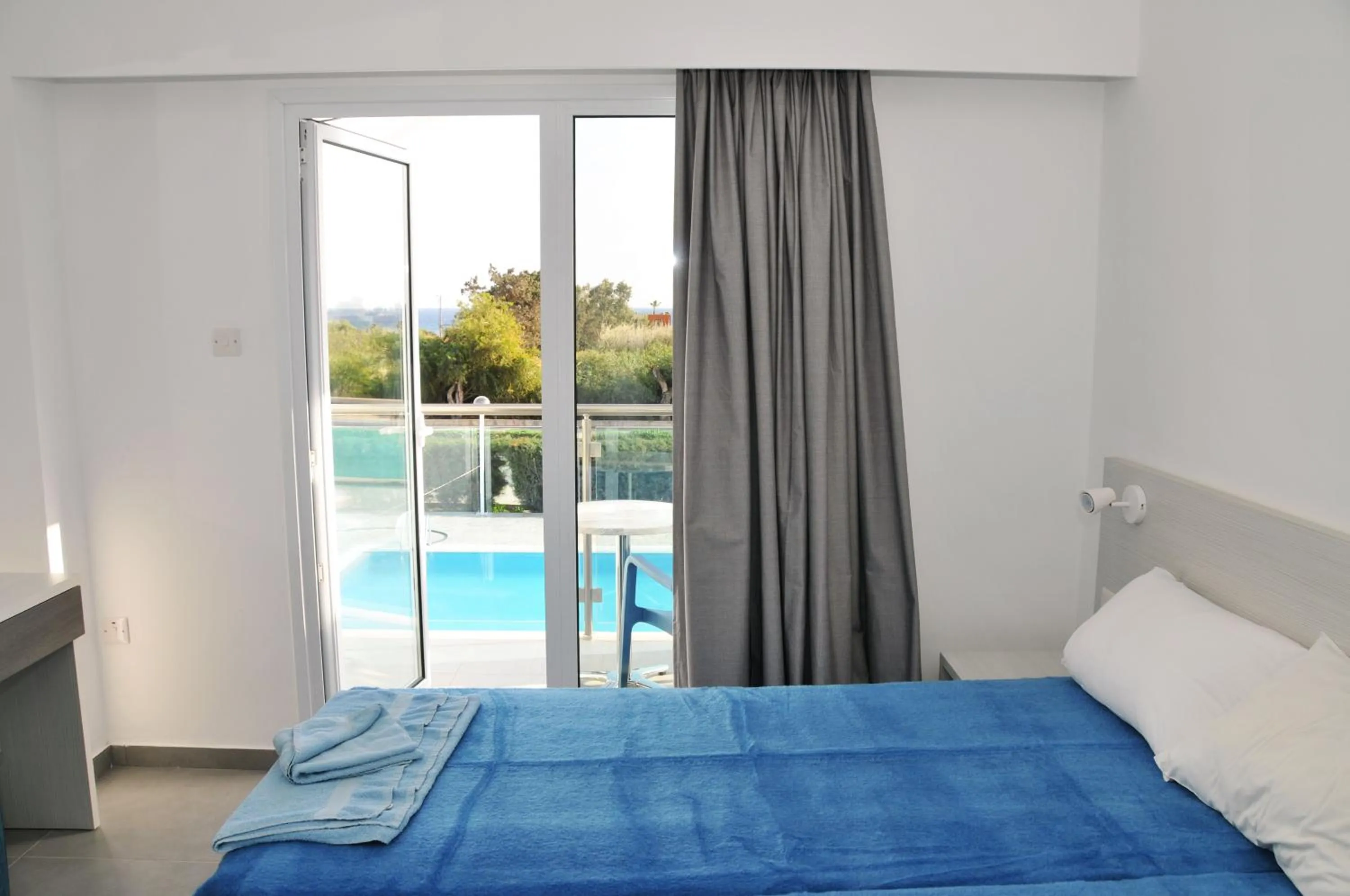 Bed in Kaos Hotel Apartments