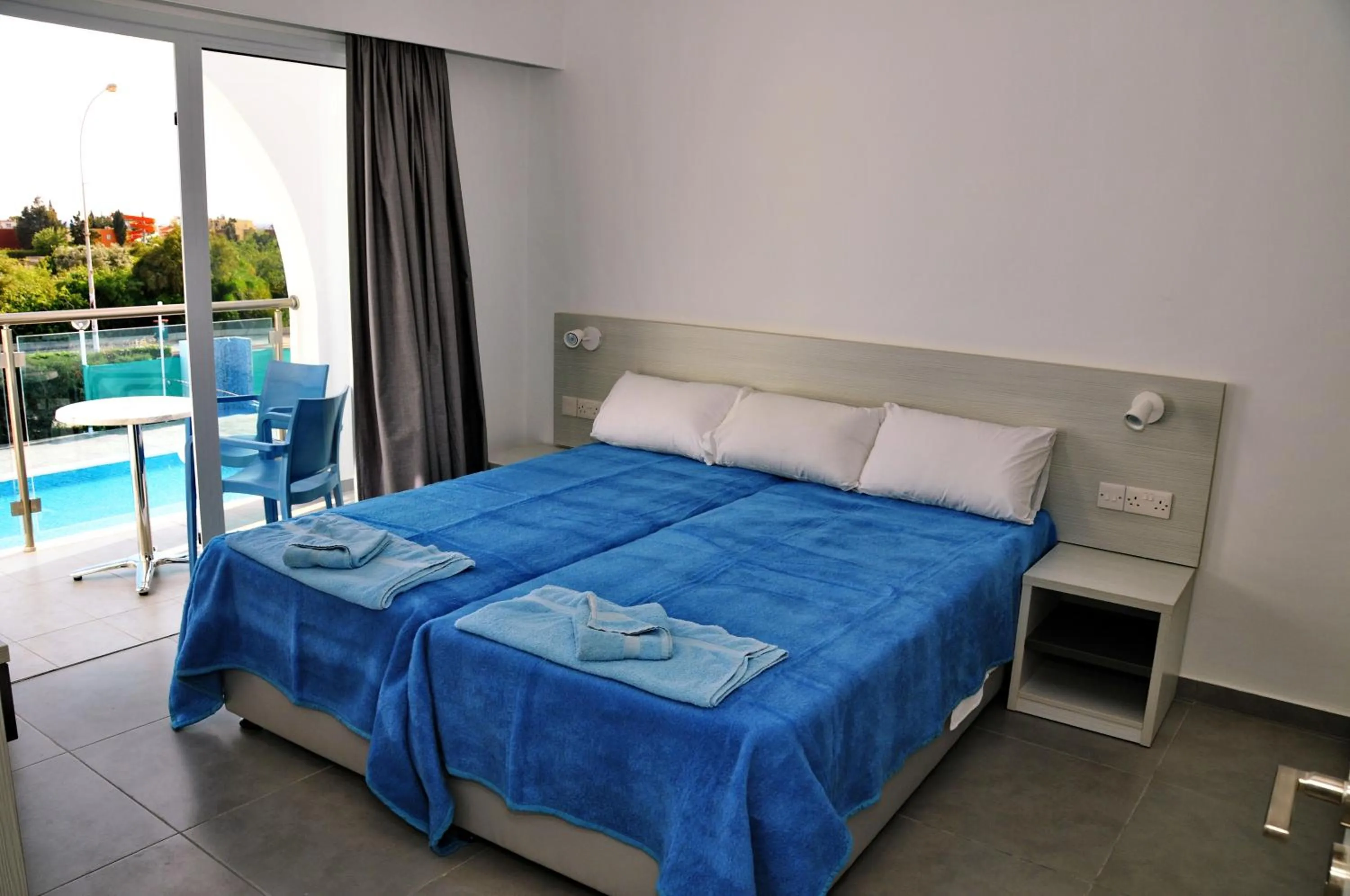 Bed in Kaos Hotel Apartments