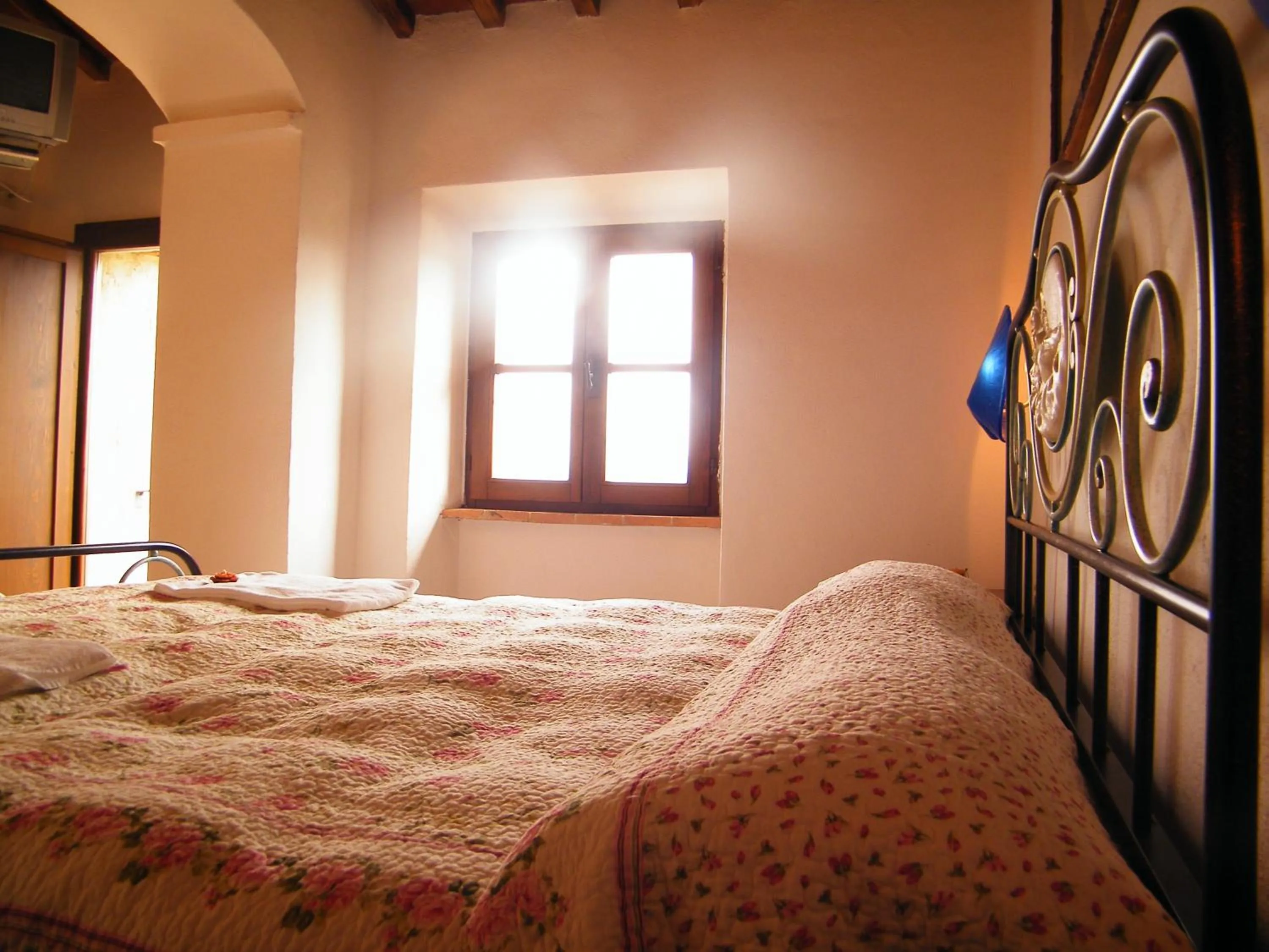 Bed in B&B La Fonte del Machiavelli