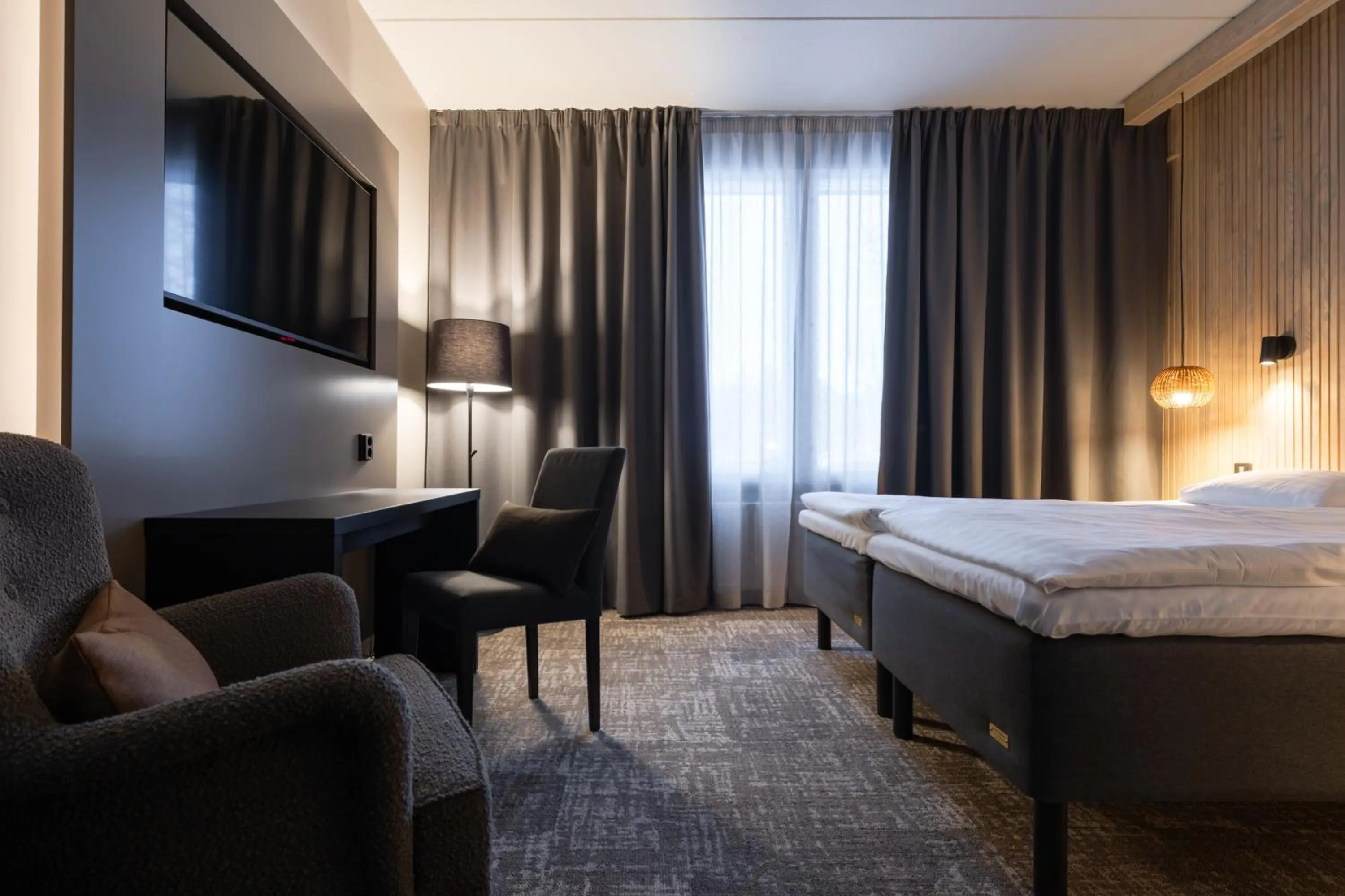 Seating area, Bed in Lapland Hotels Ylläskaltio