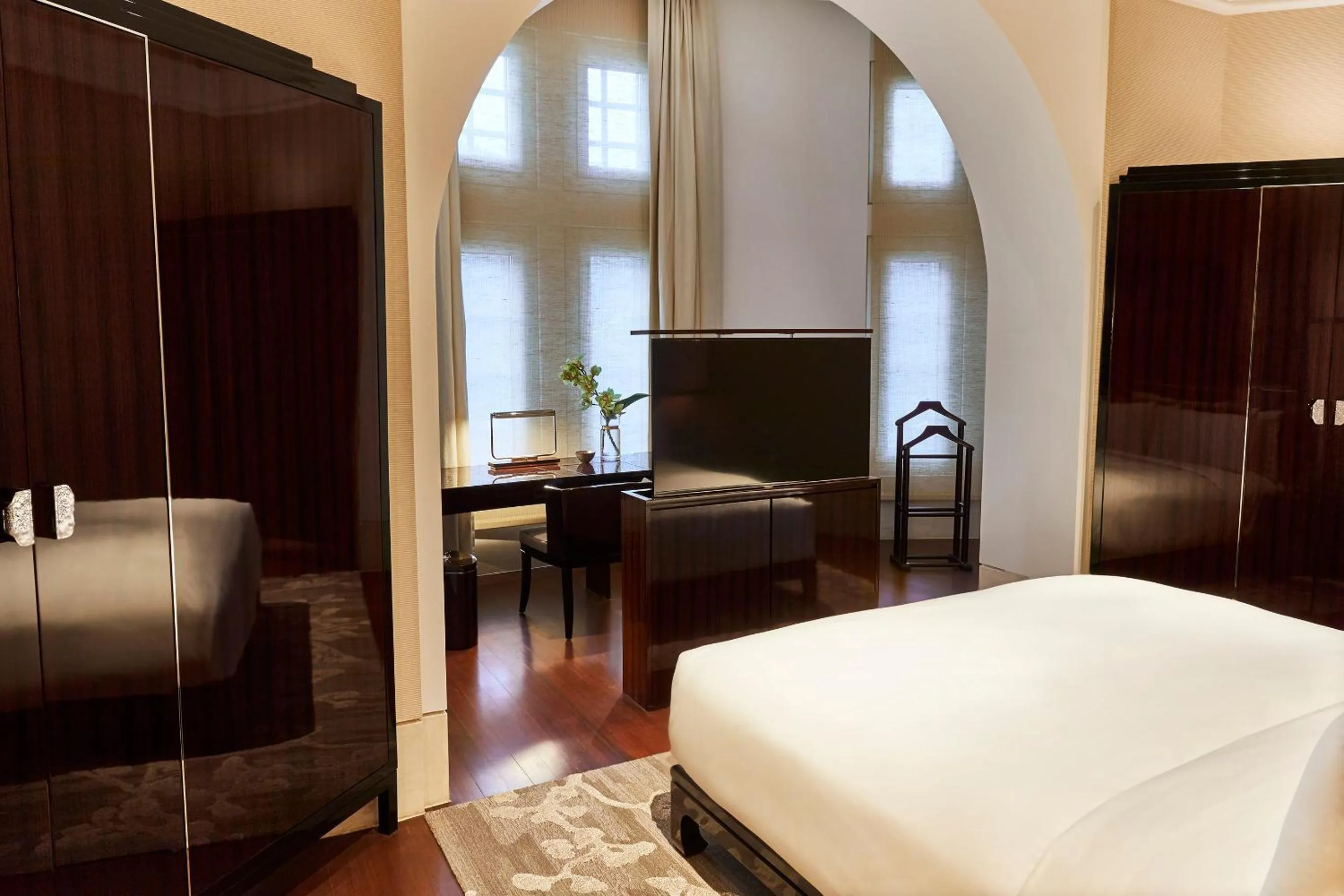 Bed in The Capitol Kempinski Hotel Singapore